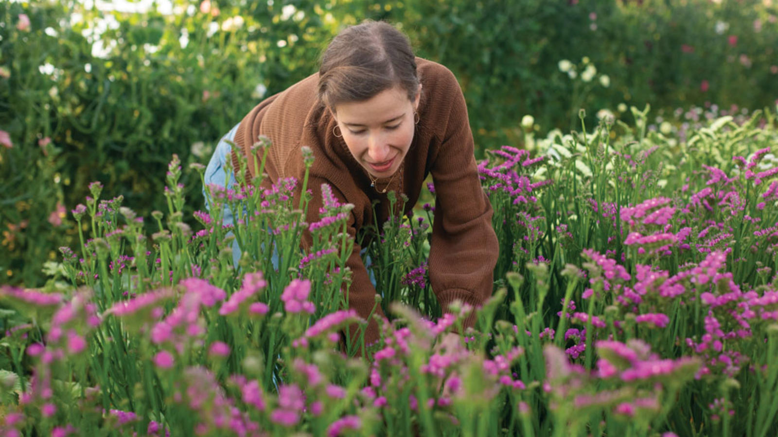 Photograph of Laura Beth Resnick ’11 gardening