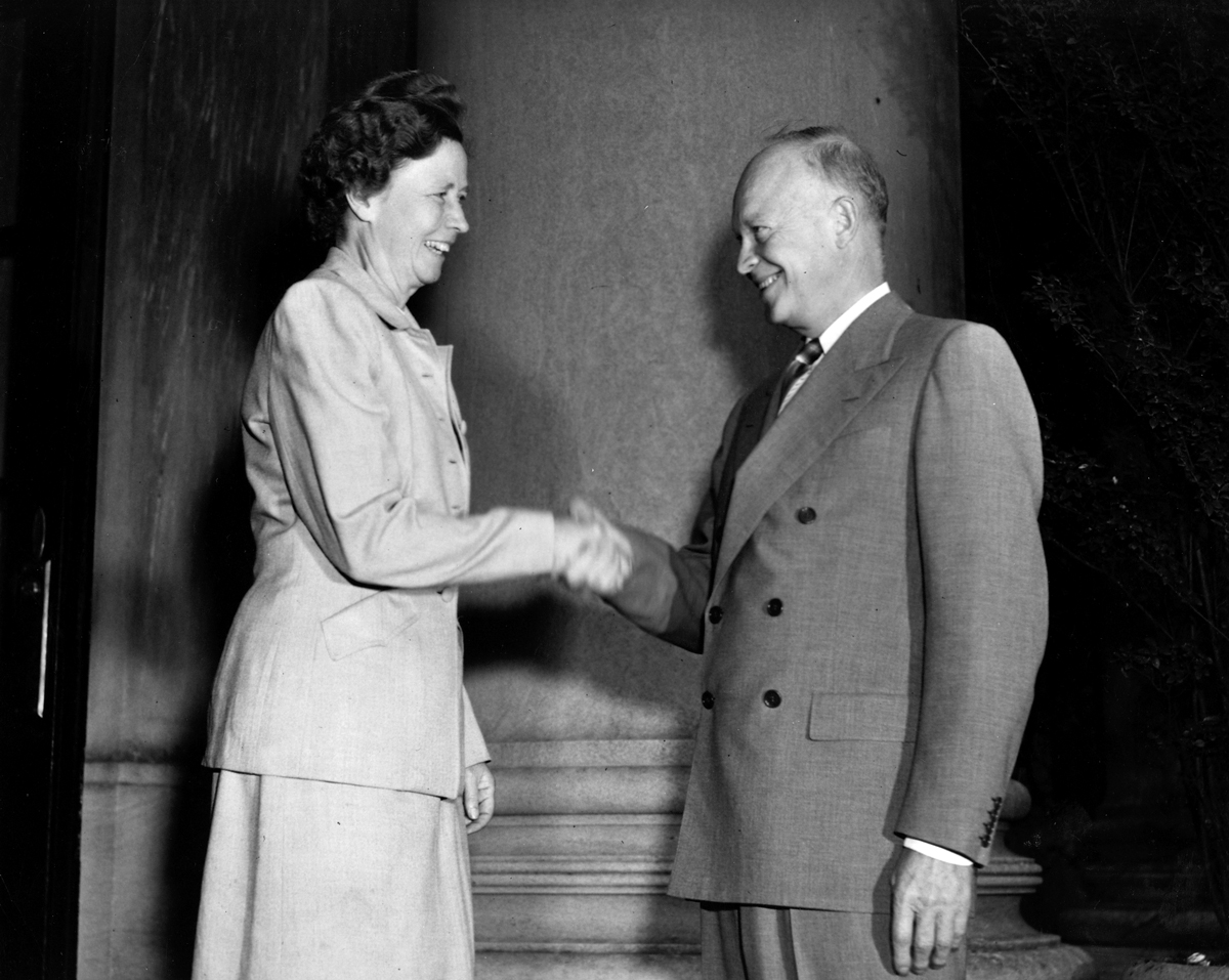 Photo of President Eisenhower greeting Barnard community member  