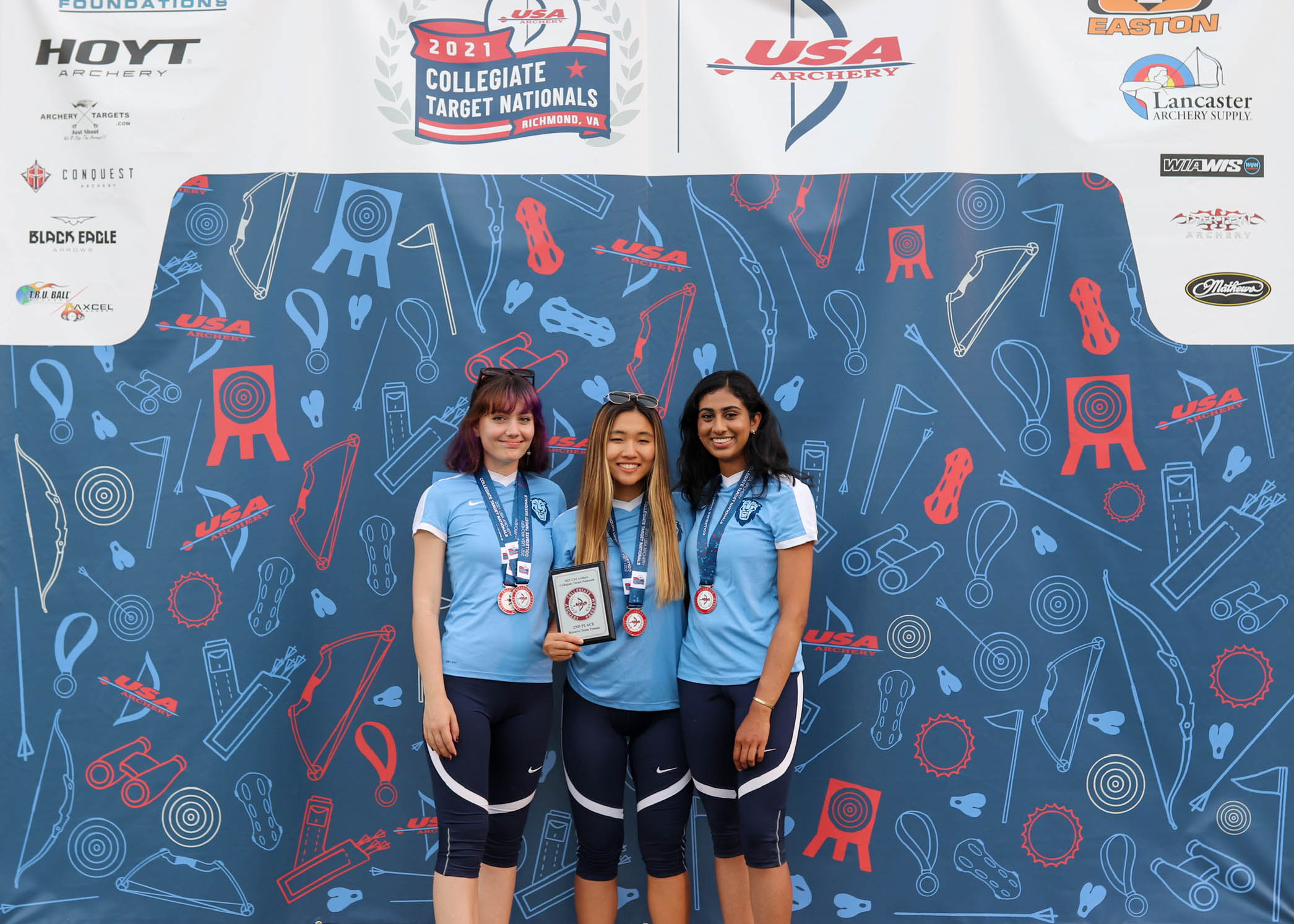 Kanchumarthi (right), Meghan Collins CC'22 (left), and Olivia Cho CC'23 (center) at the 2021 Collegiate Target Nationals in Richmond, Virginia