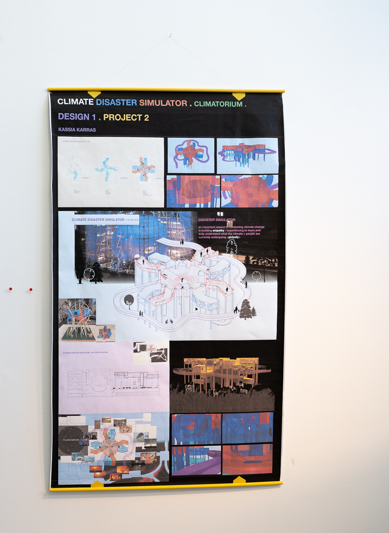 A poster shows an architectural rendering with different pulled-out information about the Climate Disaster Simulator
