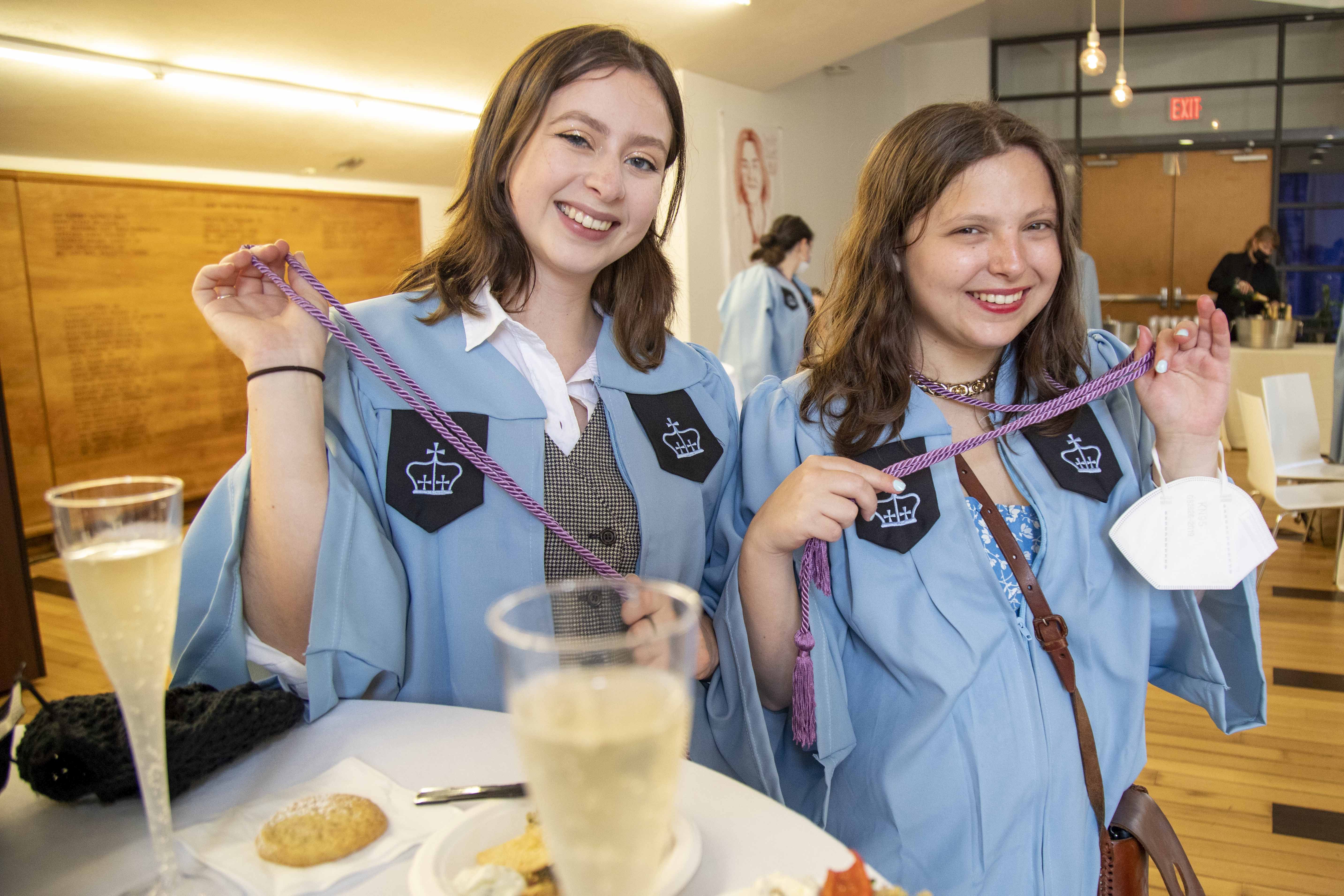 Barnard seniors Emma Tabenken and Caitlin Lent show off their newly acquired lavender cords at Barnard’s first-ever Lavender Graduation