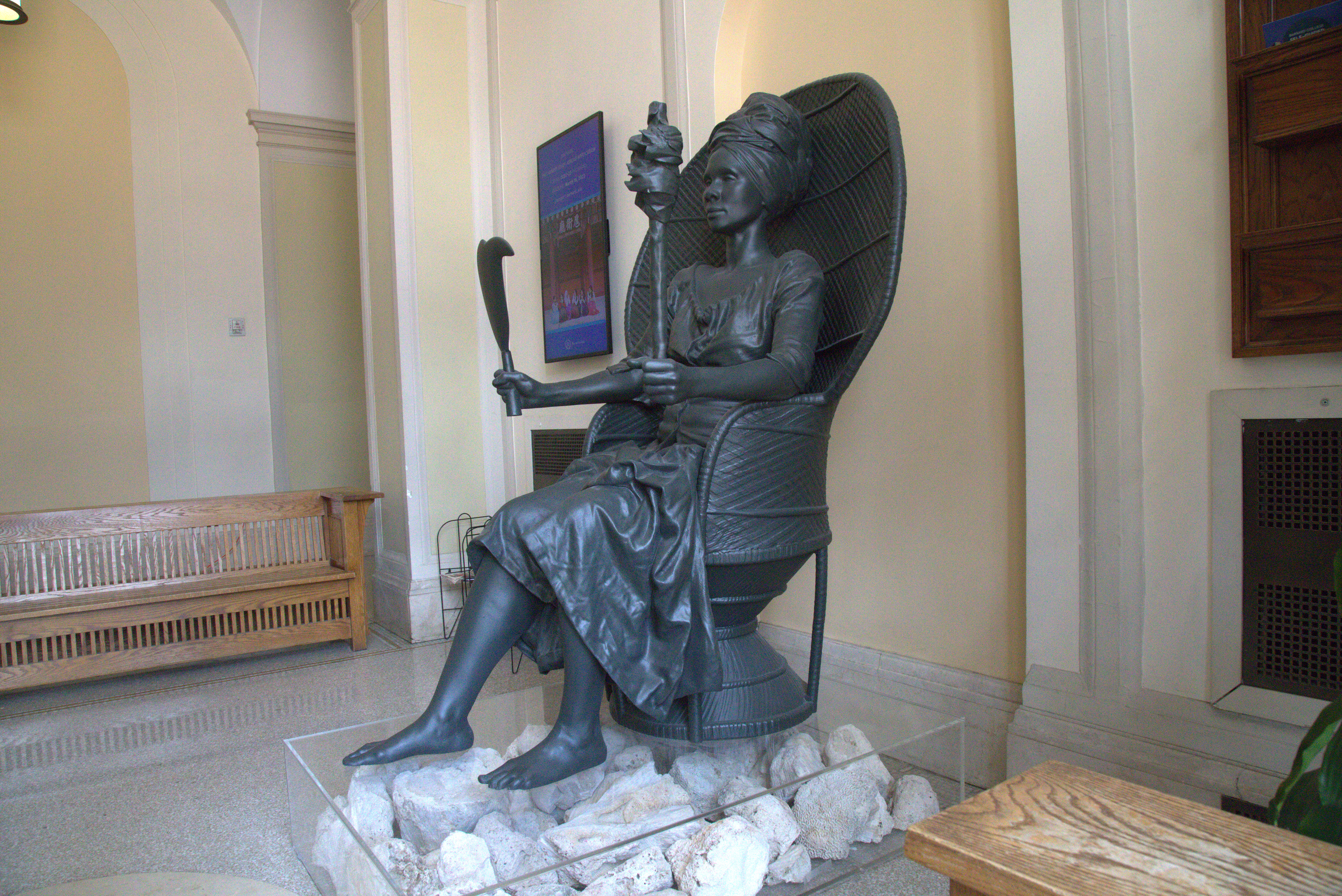 Full shot of Queen Mary statue in Barnard Hall from side angle