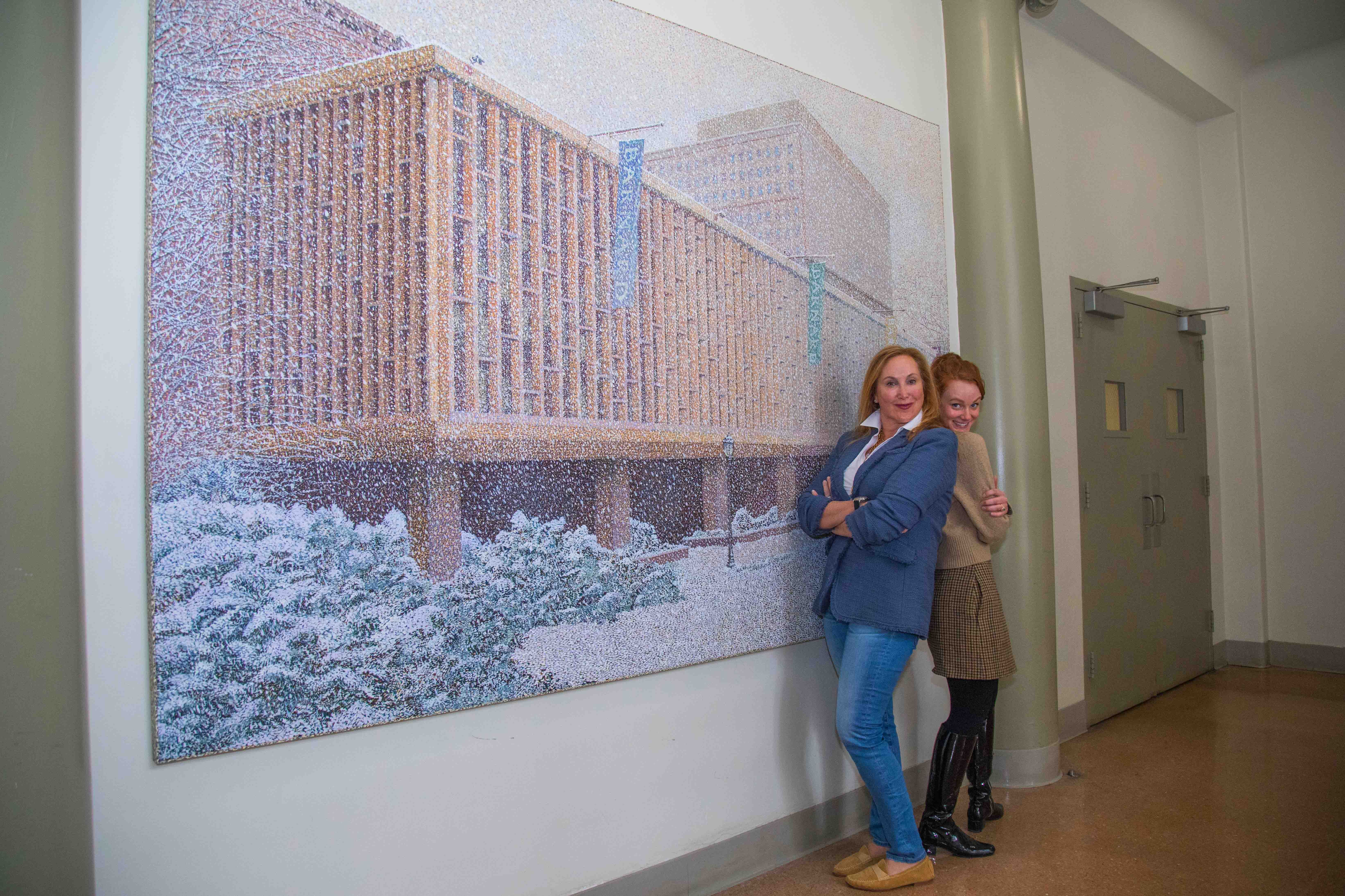 Cheryl Glicker Milstein ’82, P’14, Chair of the Barnard Board of Trustees, and Cynthia Talmadge posing in front of Lehman Hall painting