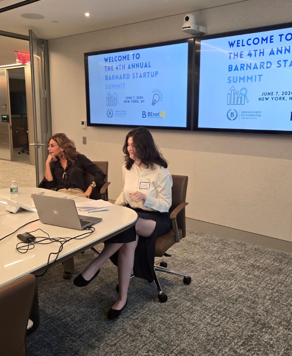 [Image description: Athena intern Lilly Montelle '27 and alum Eva Jeanbart Lorenzotti '91 sitting together at the 2024 Startup Summit]