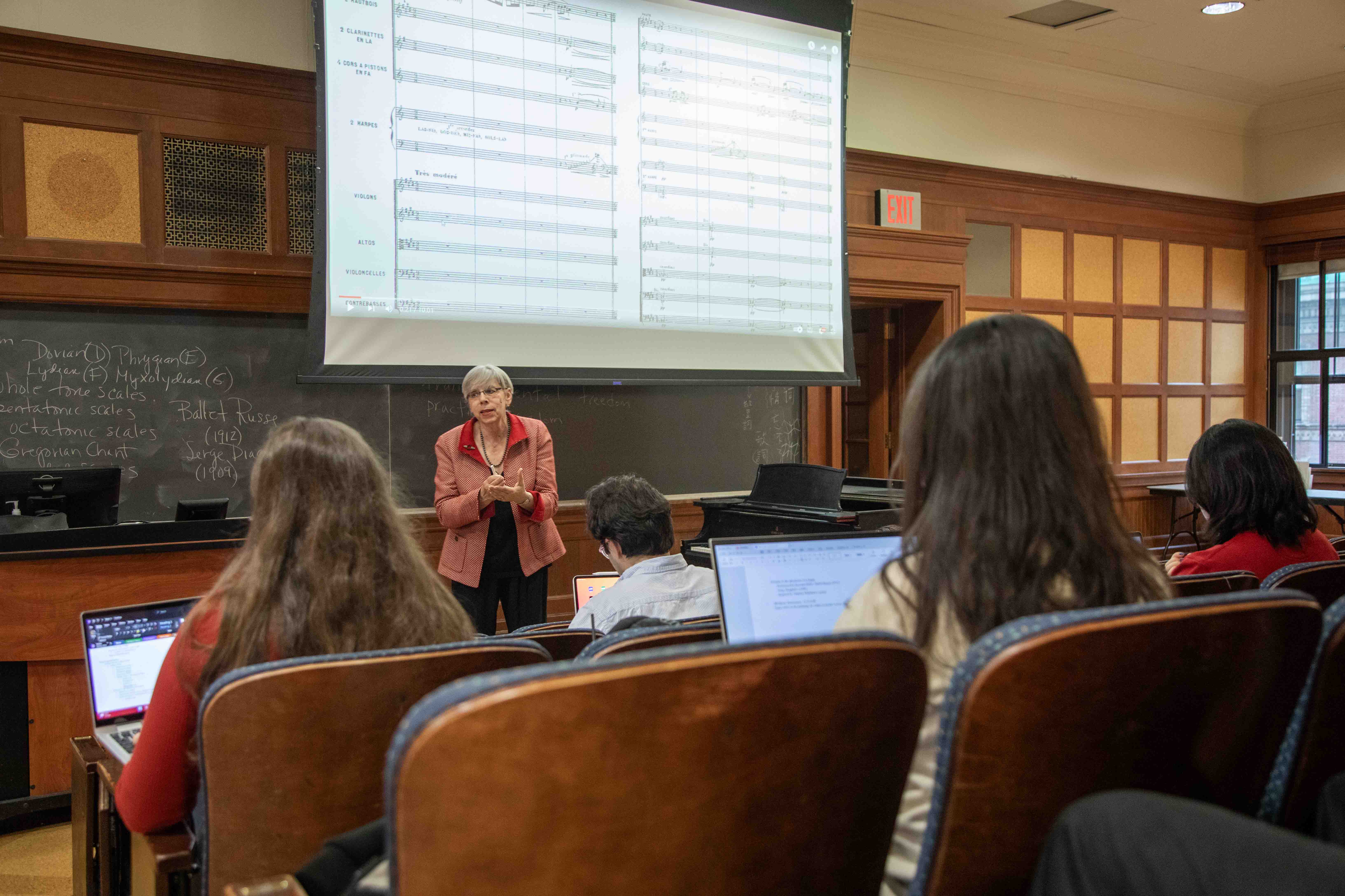 Professor standing in front of classroom