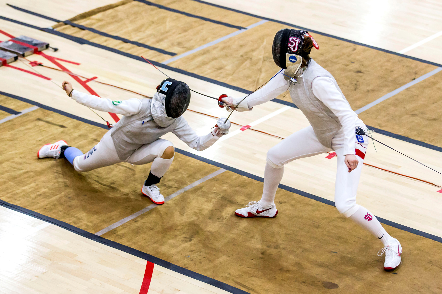 Two fencers competing