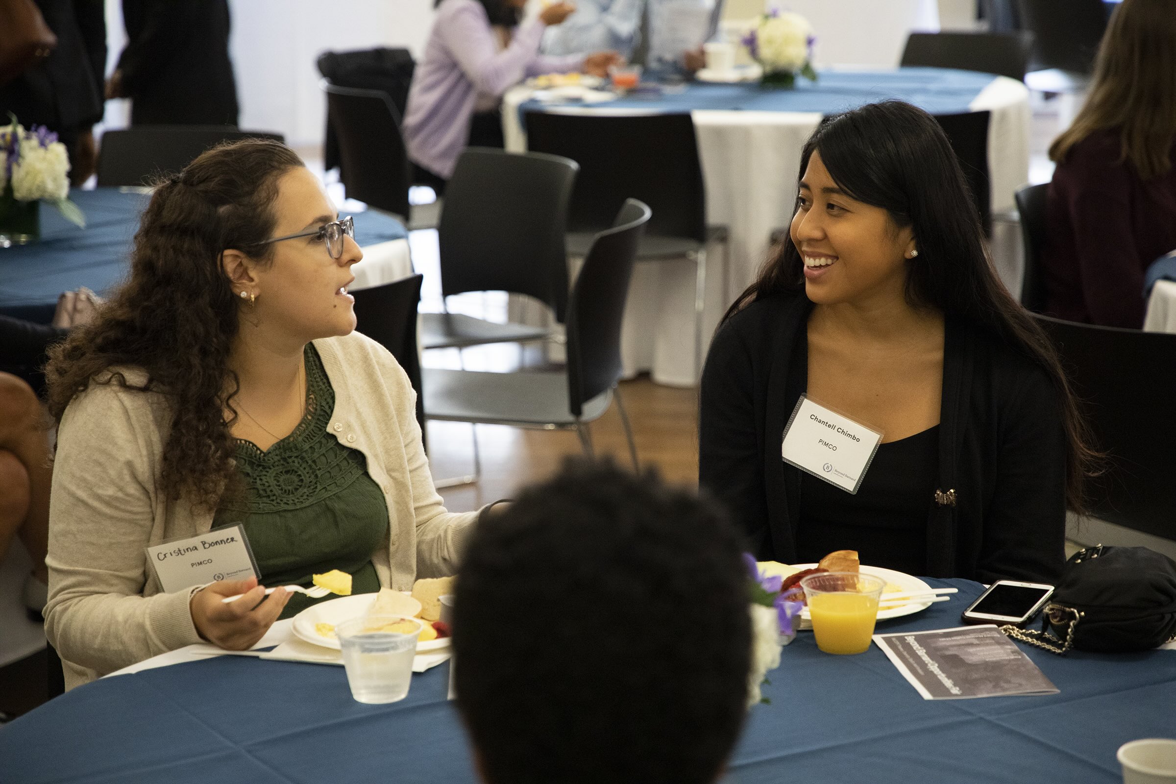 Two members of the Barnard community discussing careers in finance