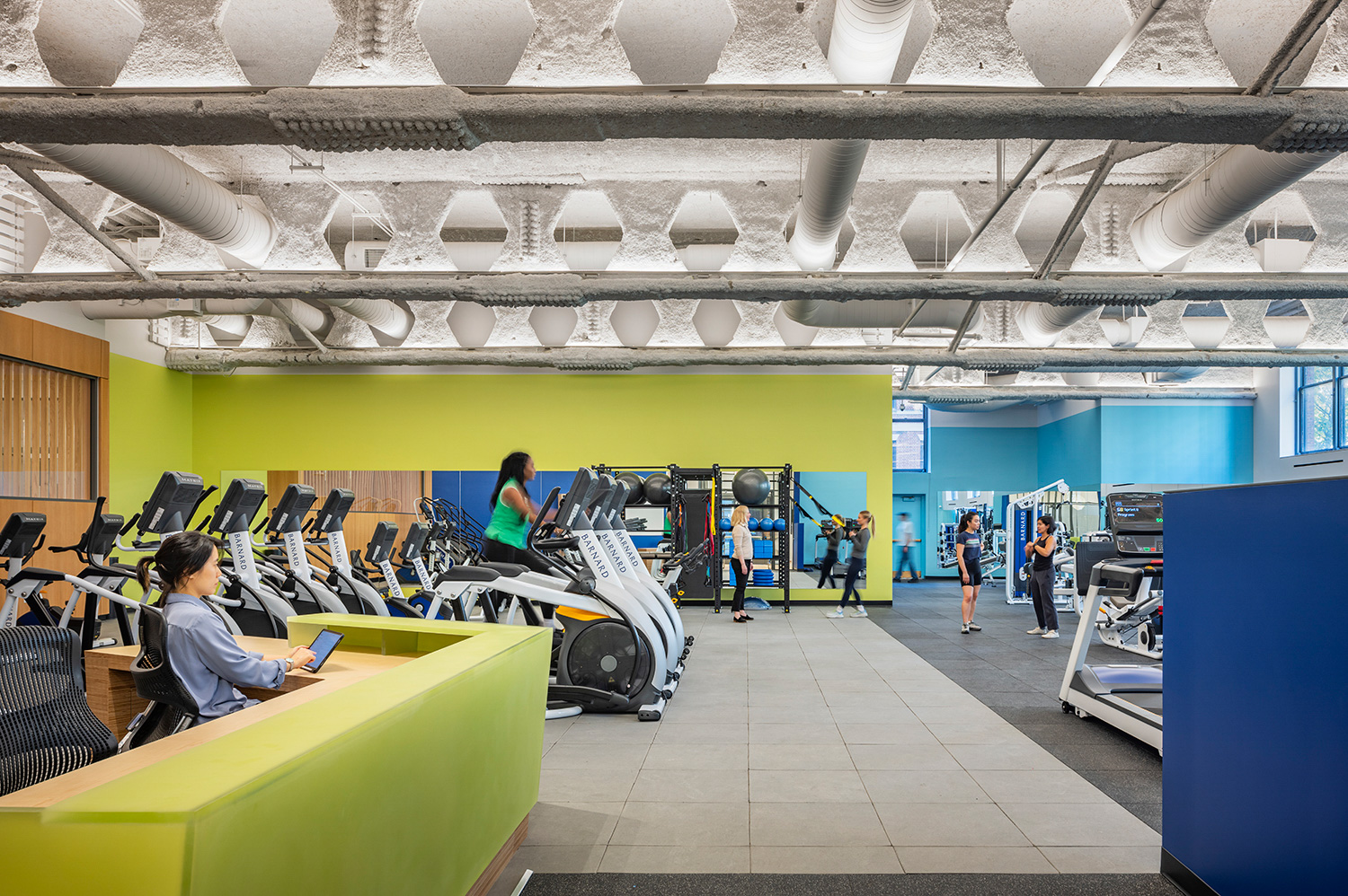 The entrance of the LeFrak gym shows bold colors and gym equipment