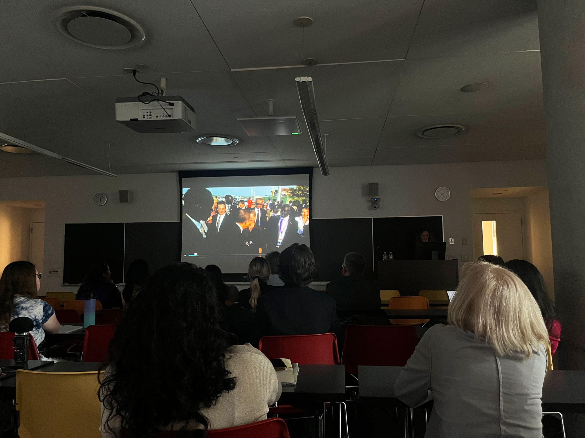 Darkened classroom with projector 