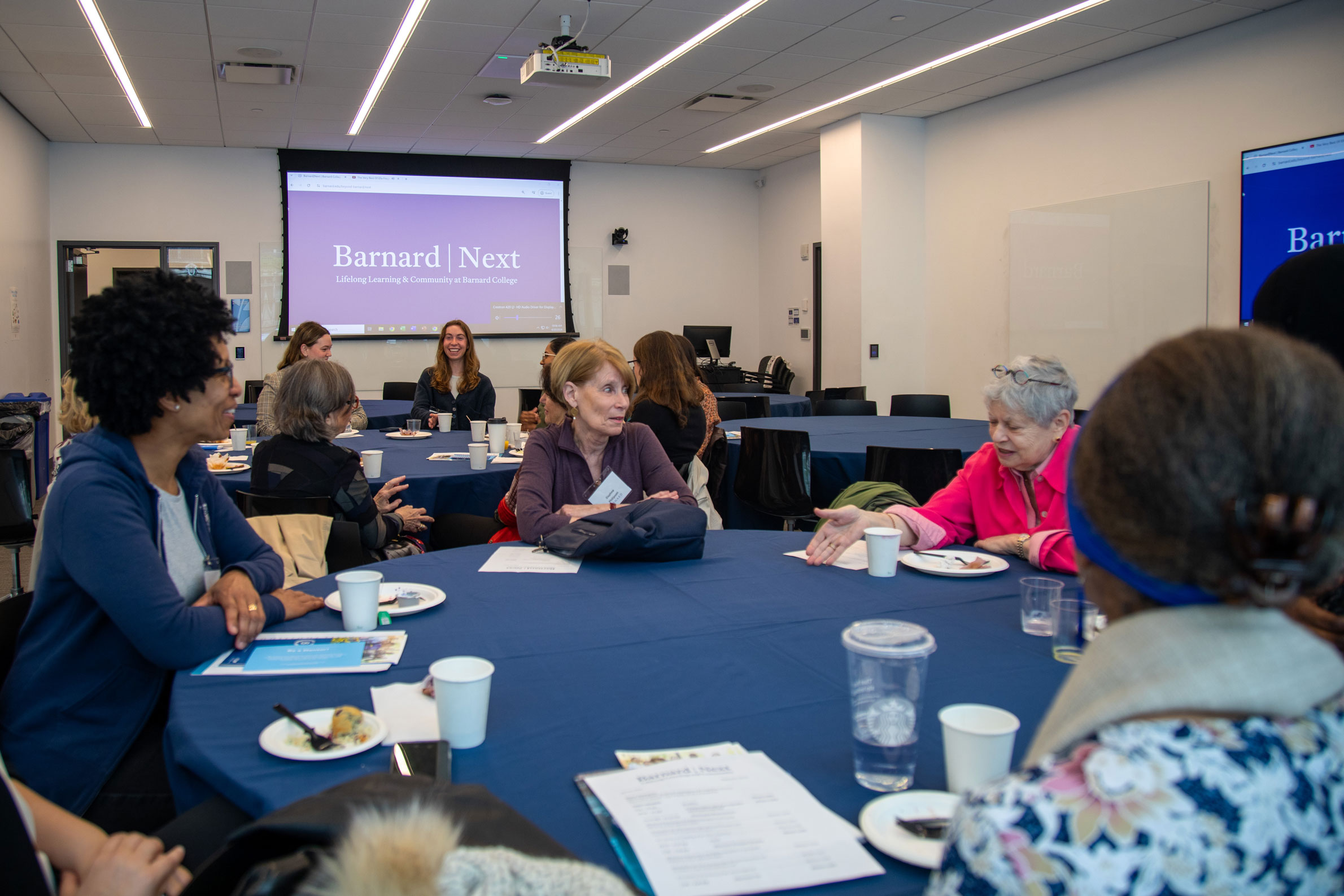 Women sitting at round table talking