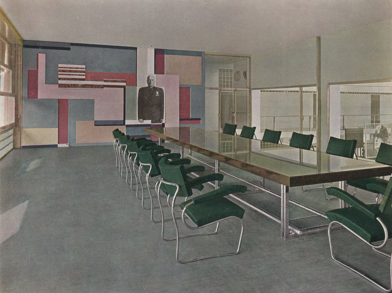 Illustration of green chairs surrounding a conference table