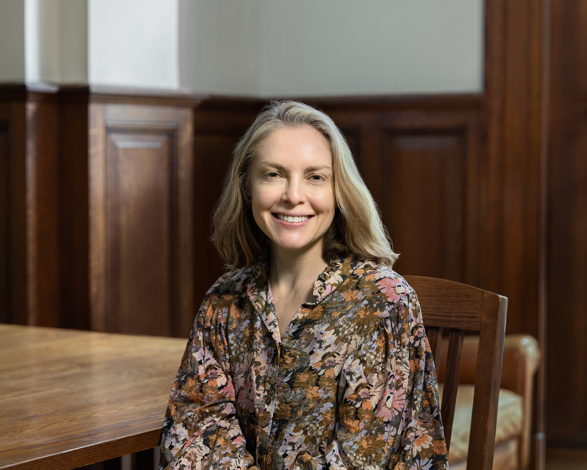 Photo of Serena Longley sitting in a chair