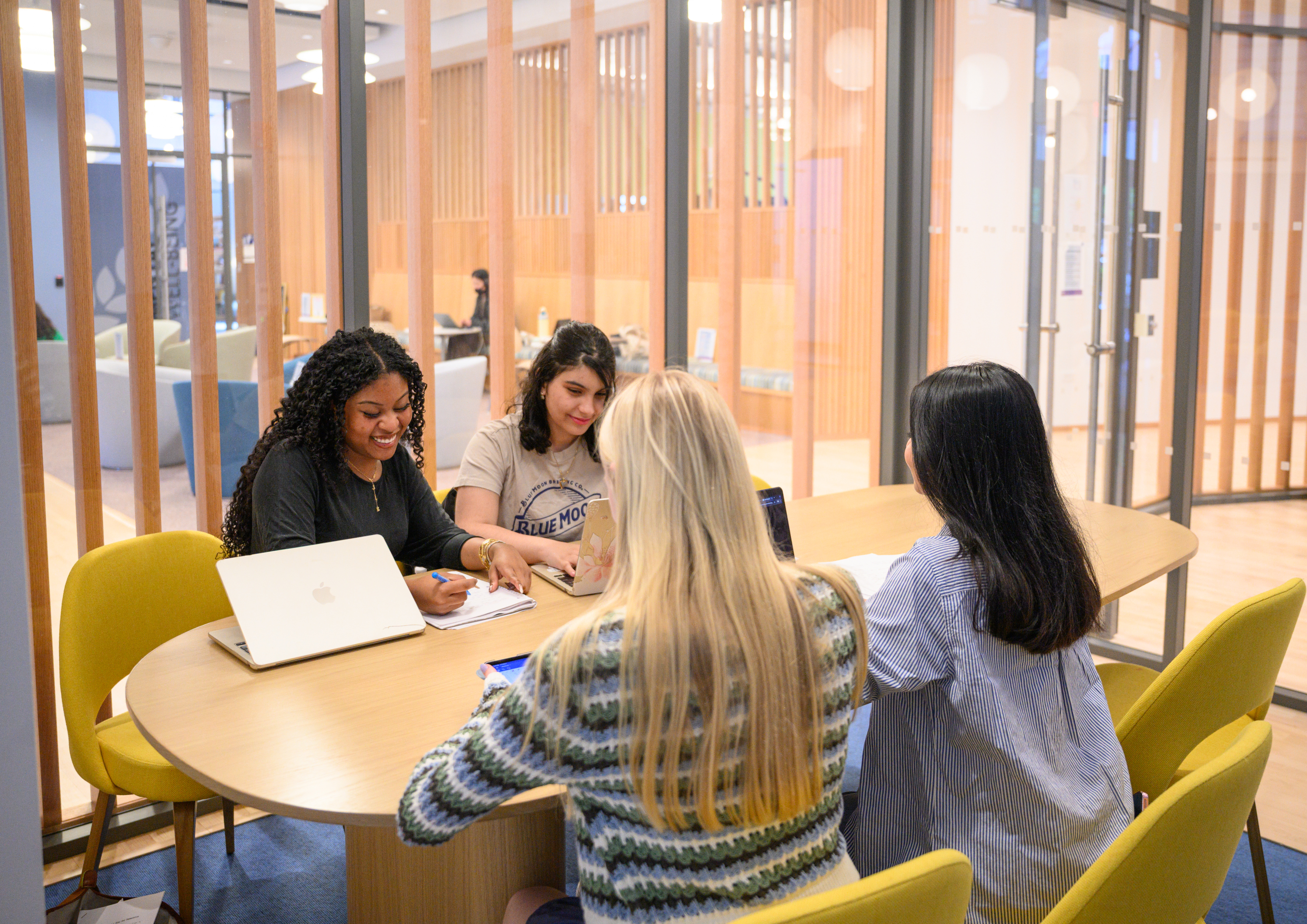 students at a desk 