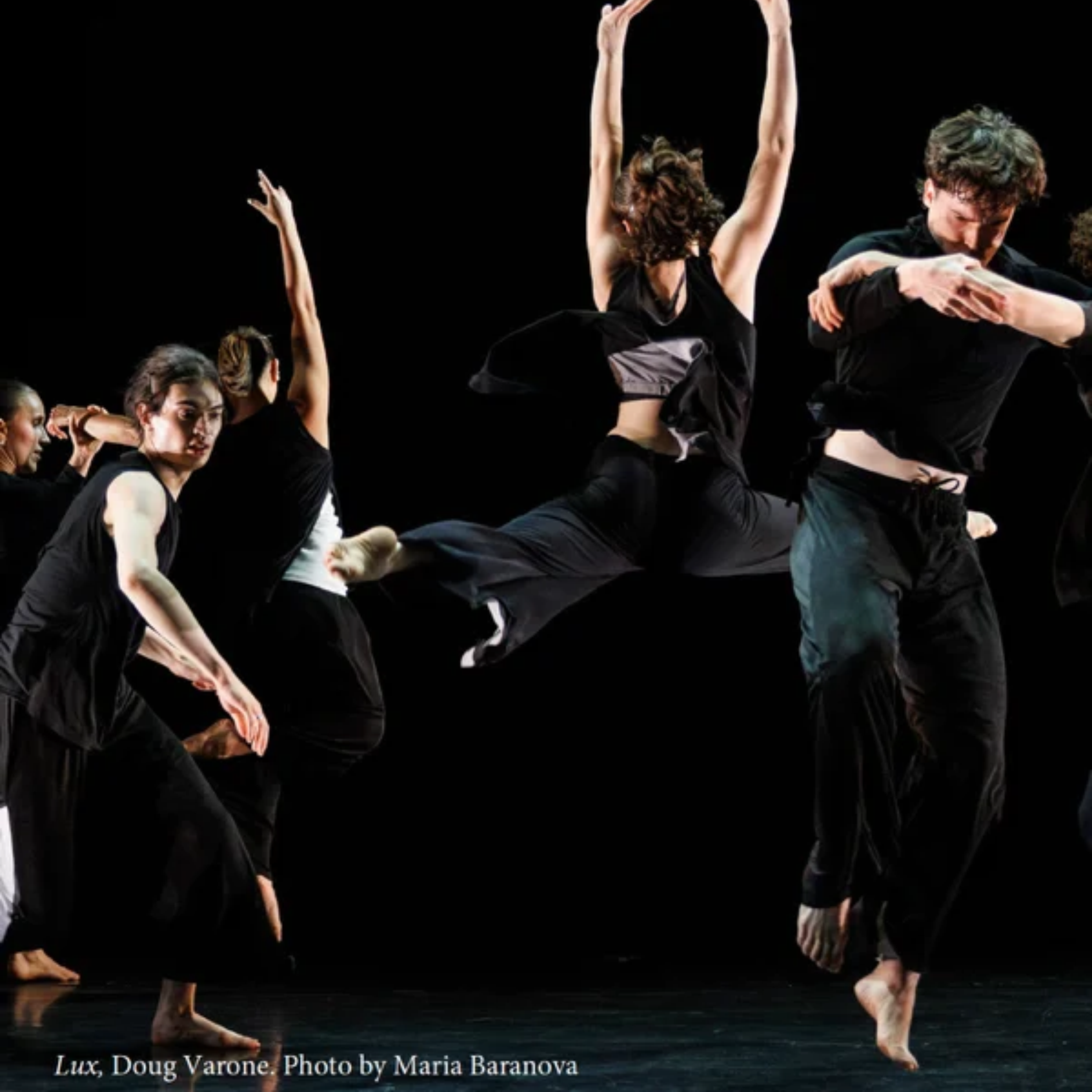 dancers in various positions on stage