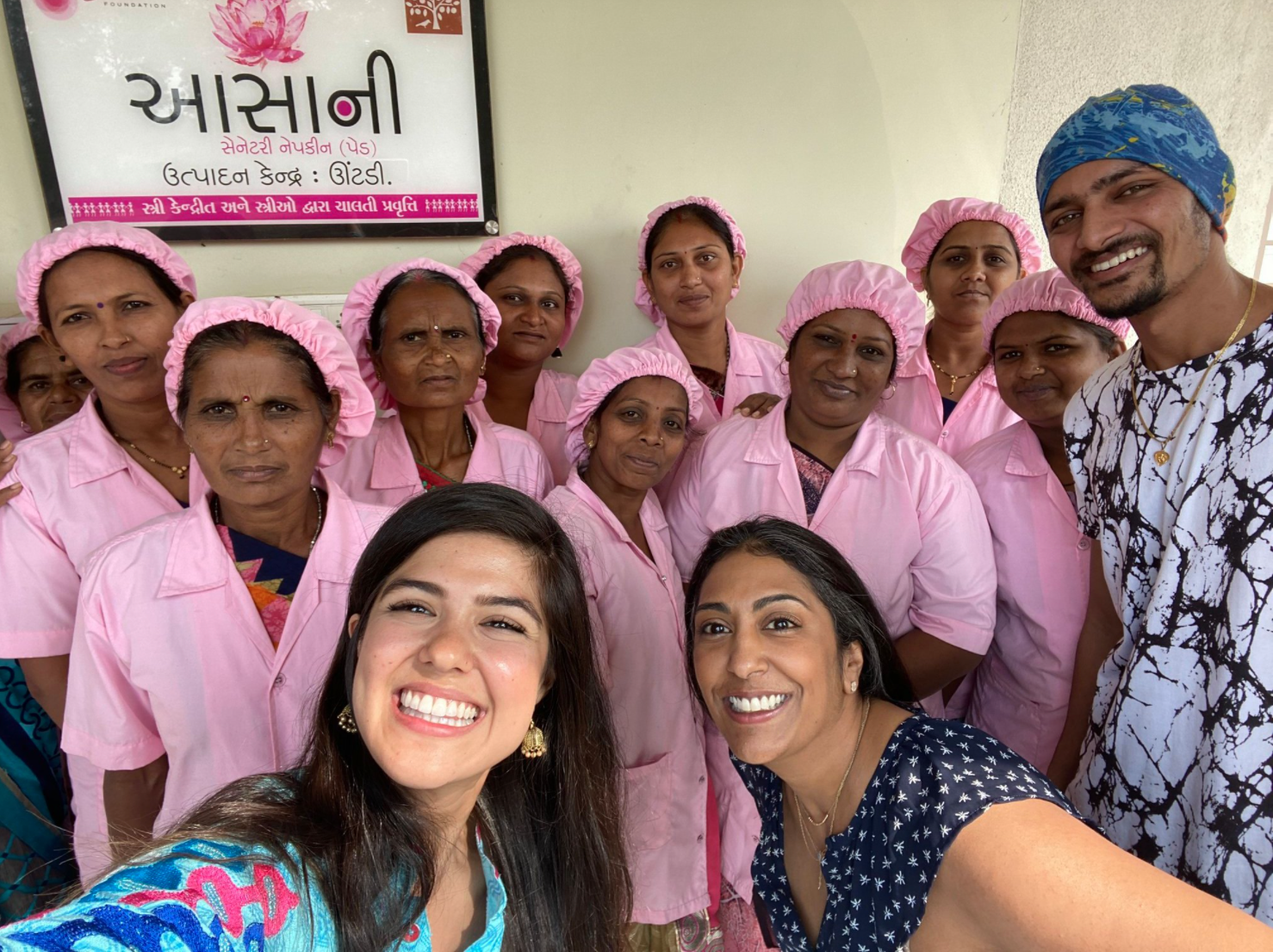 Megha Desai and Singer Ari Afsar (Hamilton, Jeanette) visiting the women who work at the Desai Foundation's Asani Sanitary Napkin production unit in Gujarat