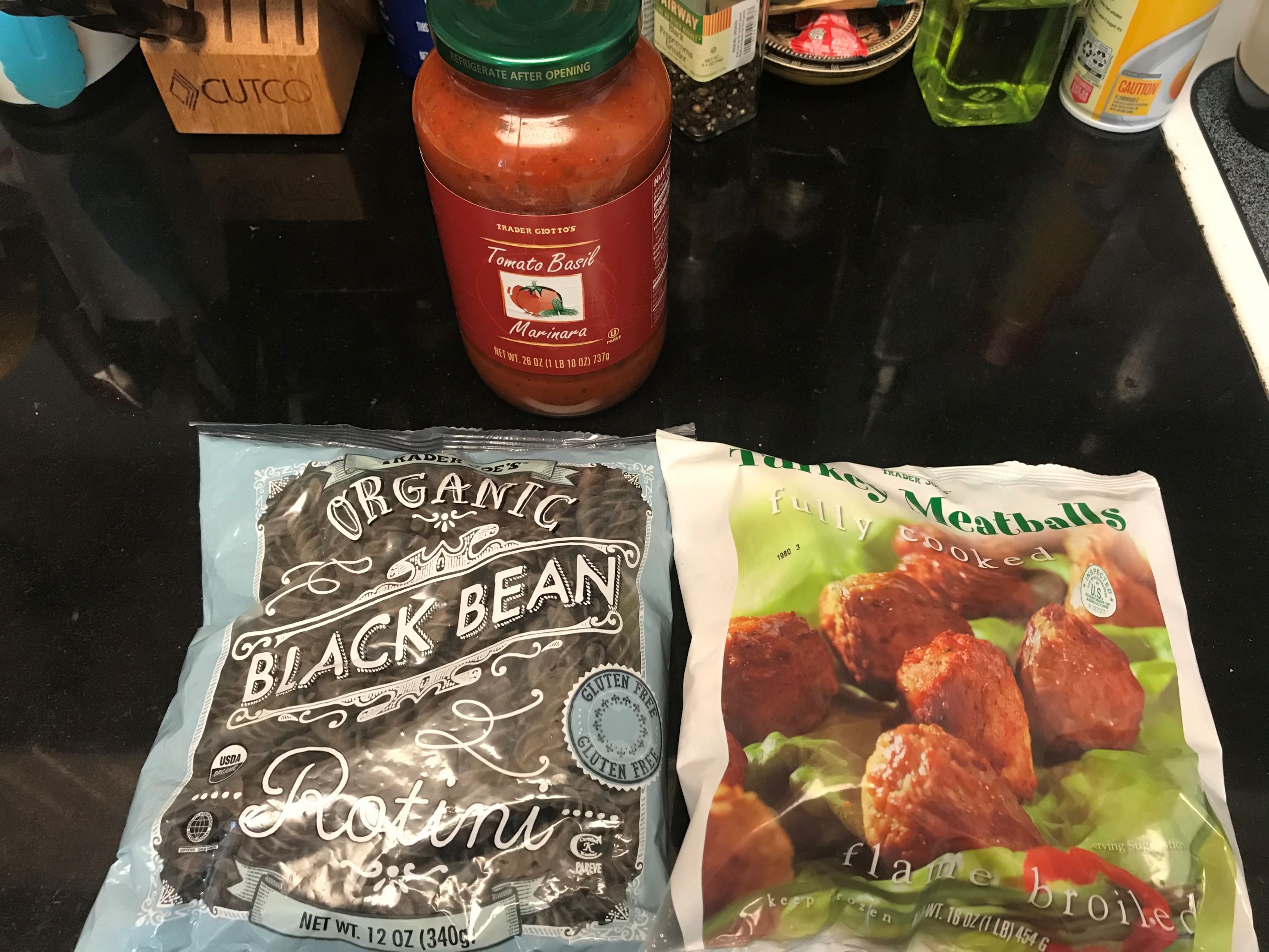 two bags of frozen ingredients and a jar of marinara sauce