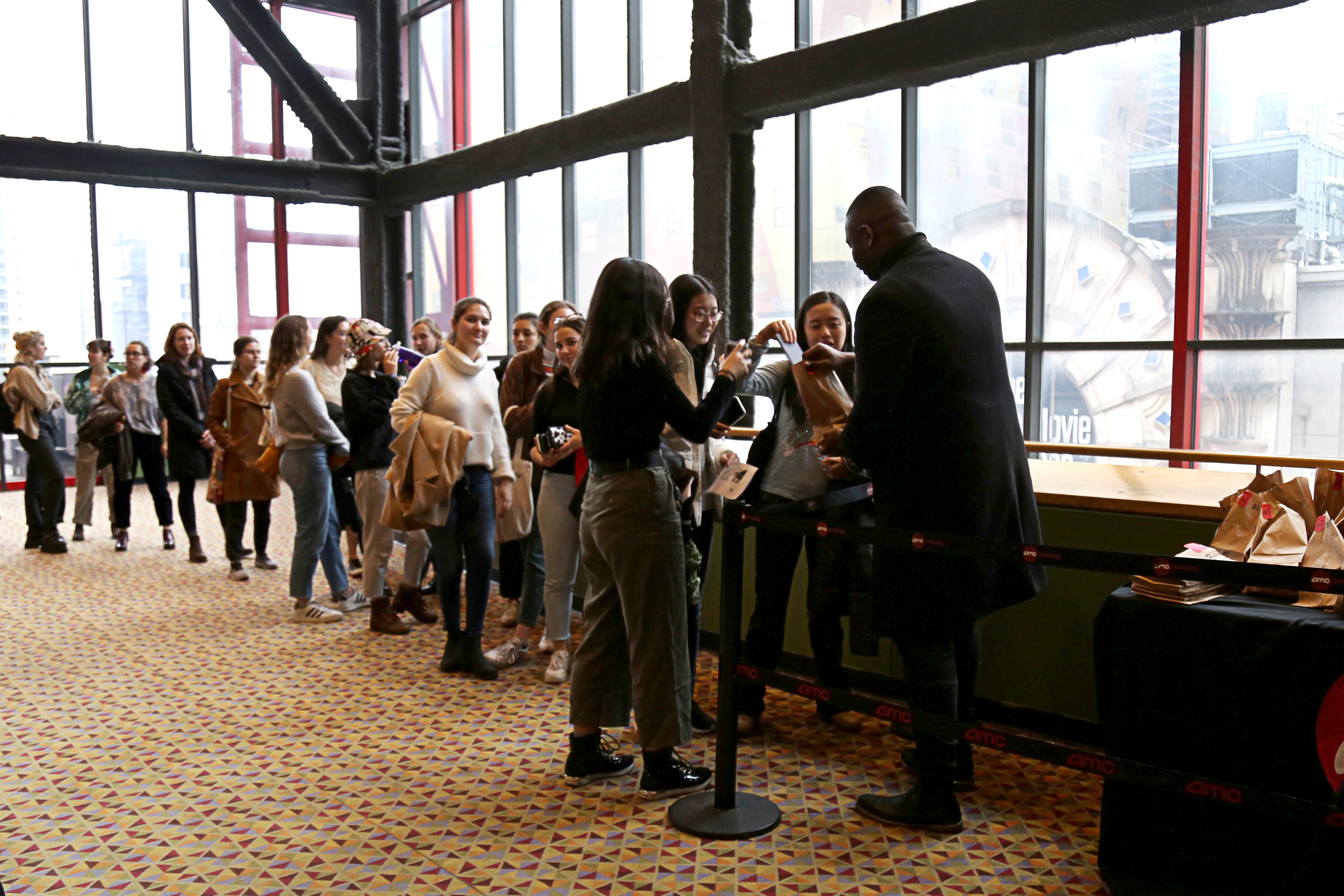 Students line up to screen "Little Women."