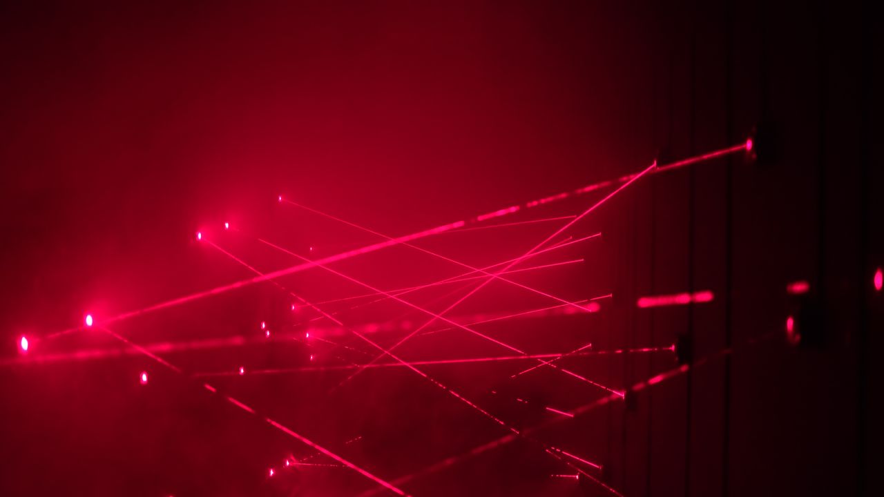 An image depicting lasers that are the heart of Nobel Laureate Donna Strickland's research. Her work has led to improvements in laser eye surgery, cancer treatment and more.