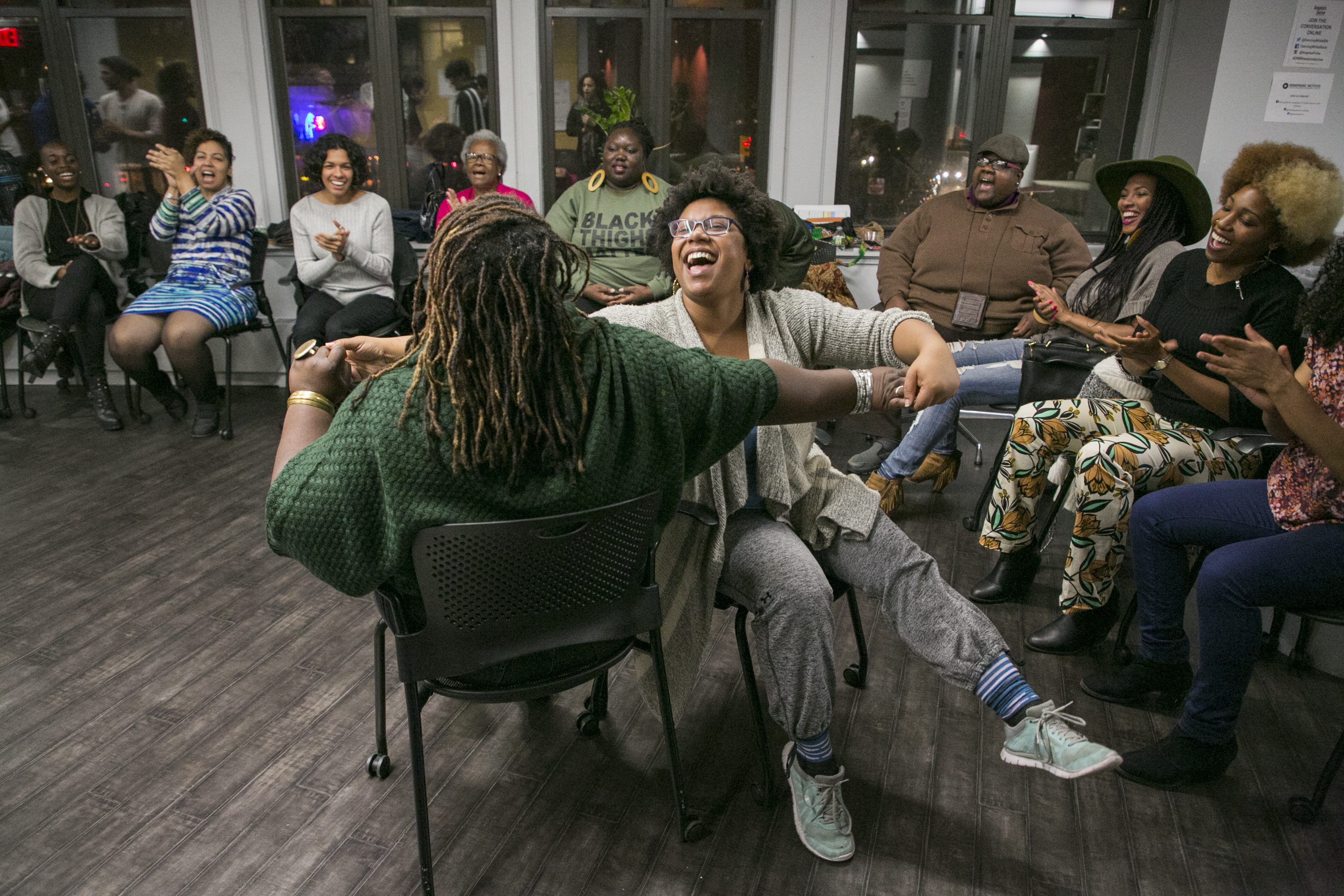 Ebony Noelle Golden and Sydnie L. Mosley ('15-'16 DWB Fellow) share a moment of pure joy surrounded by a circle of Dancing While Black community members at Dancing While Black: This Body Knows Freedom - Story Circles on Organizing toward Vision in an Age of Resistance at NYU's Hemispheric Institute in November 2017.