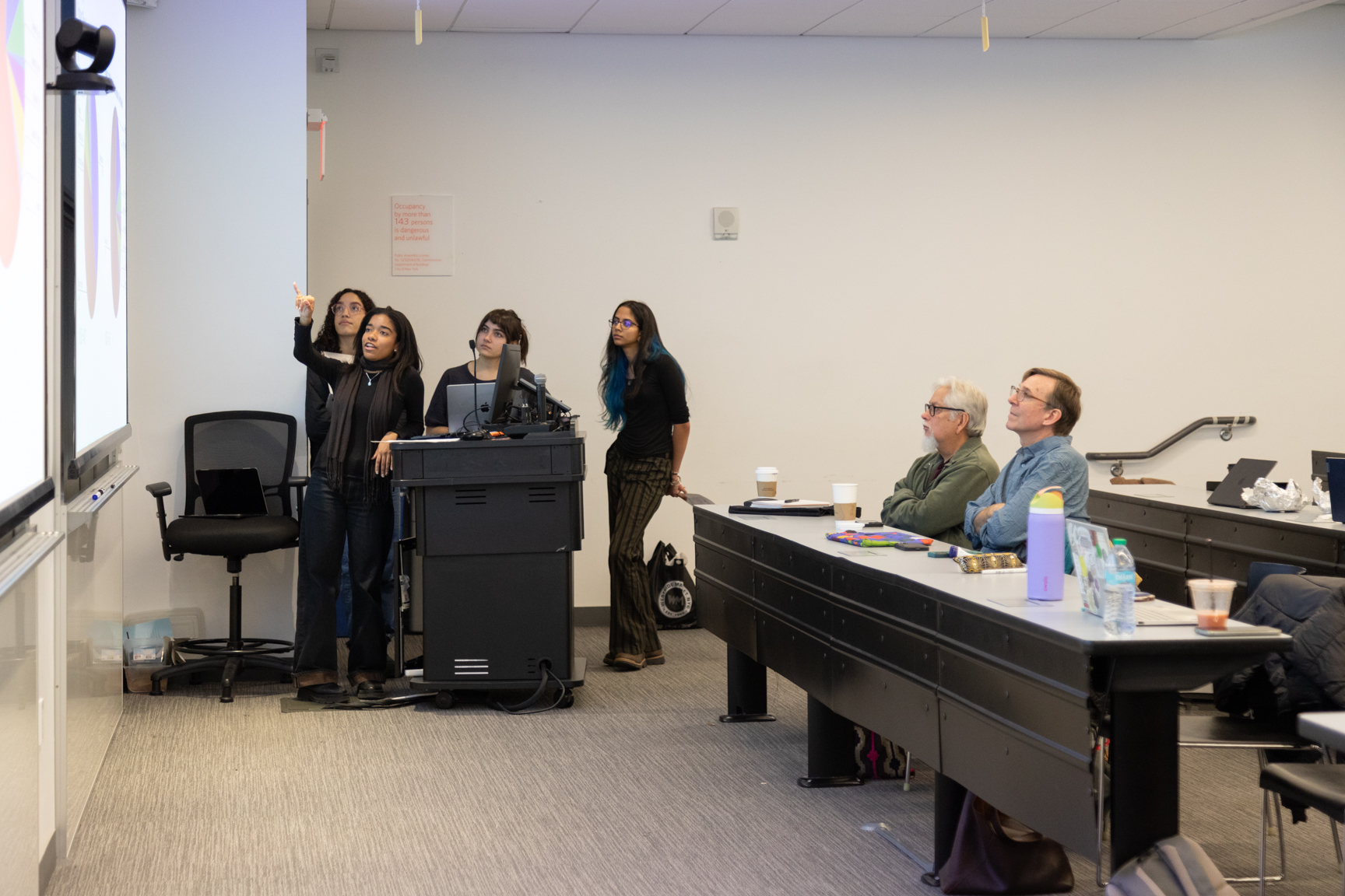 Students present to Levi Romero