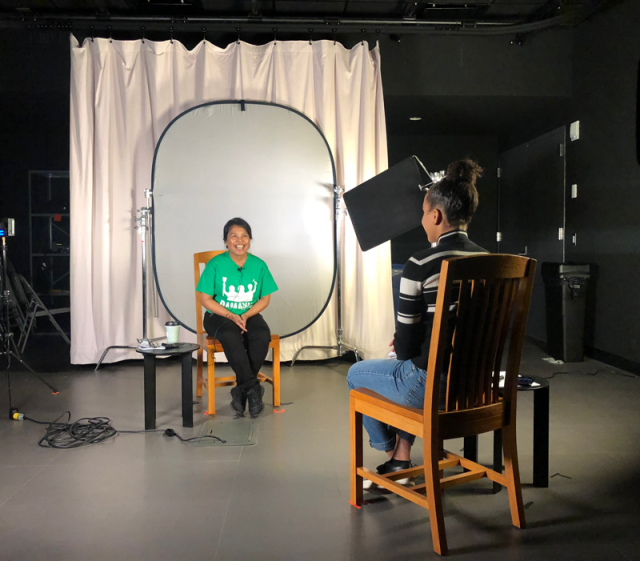 photo of Premilla podcasting