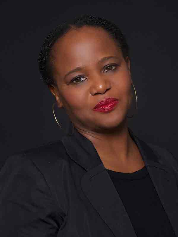 Author Edwidge Danticat in a black suit