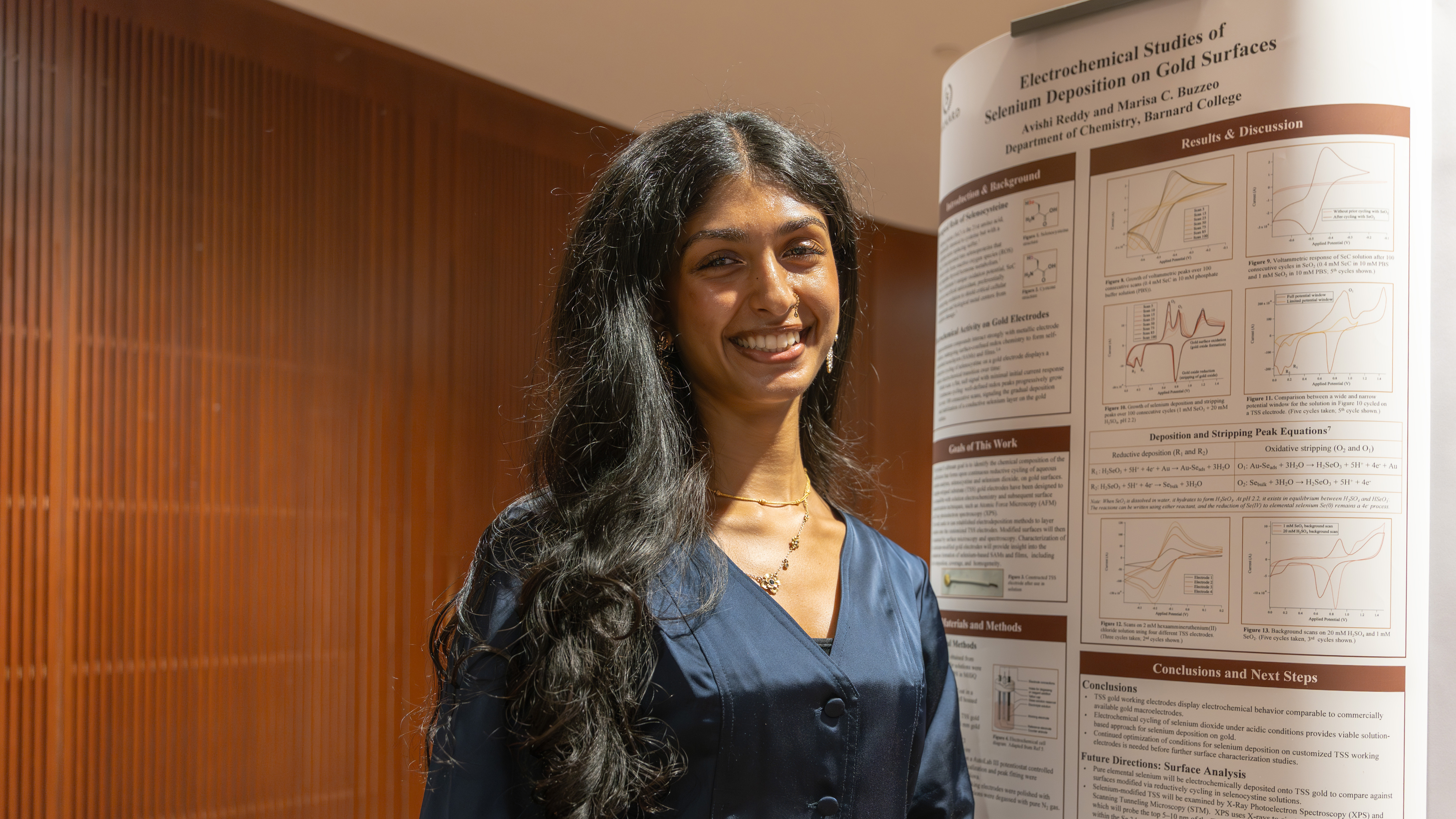 Avishi Reddy presents research at poster session