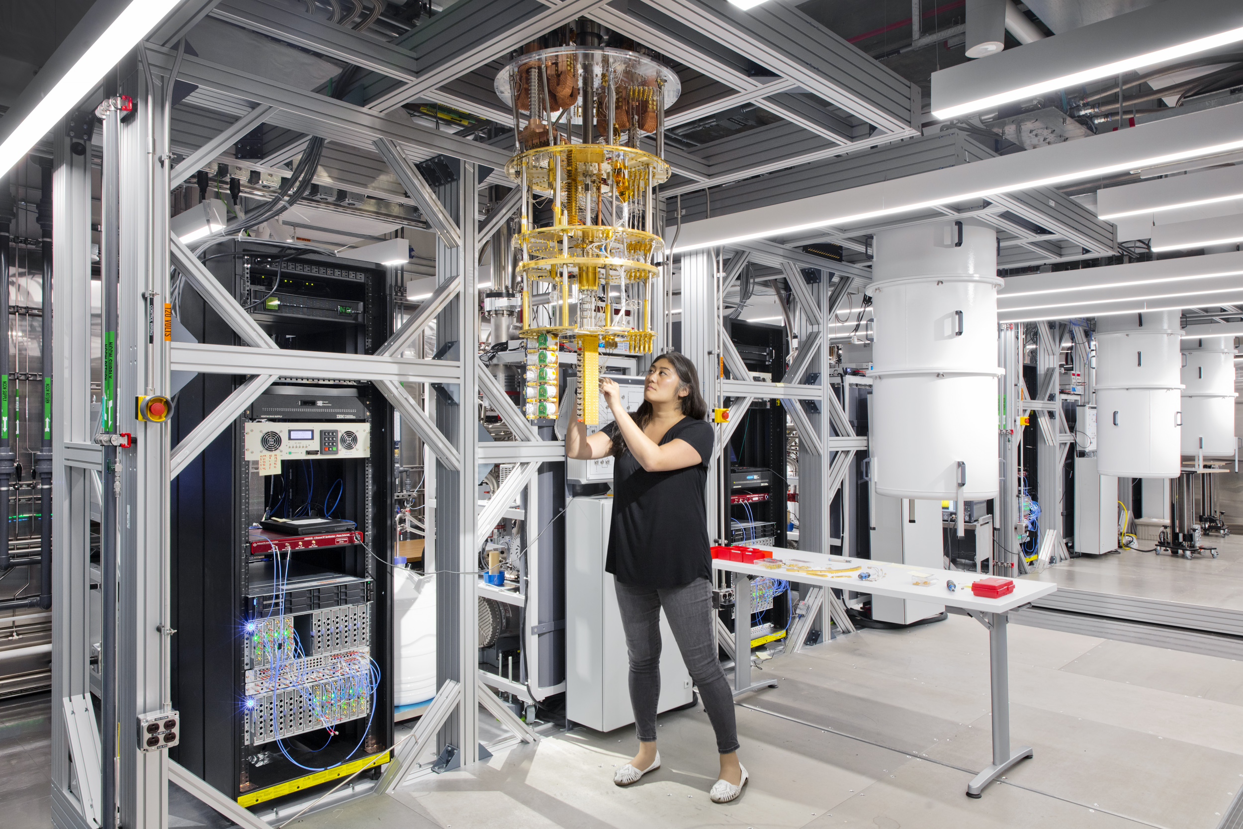 Woman working with quantum computing devices.