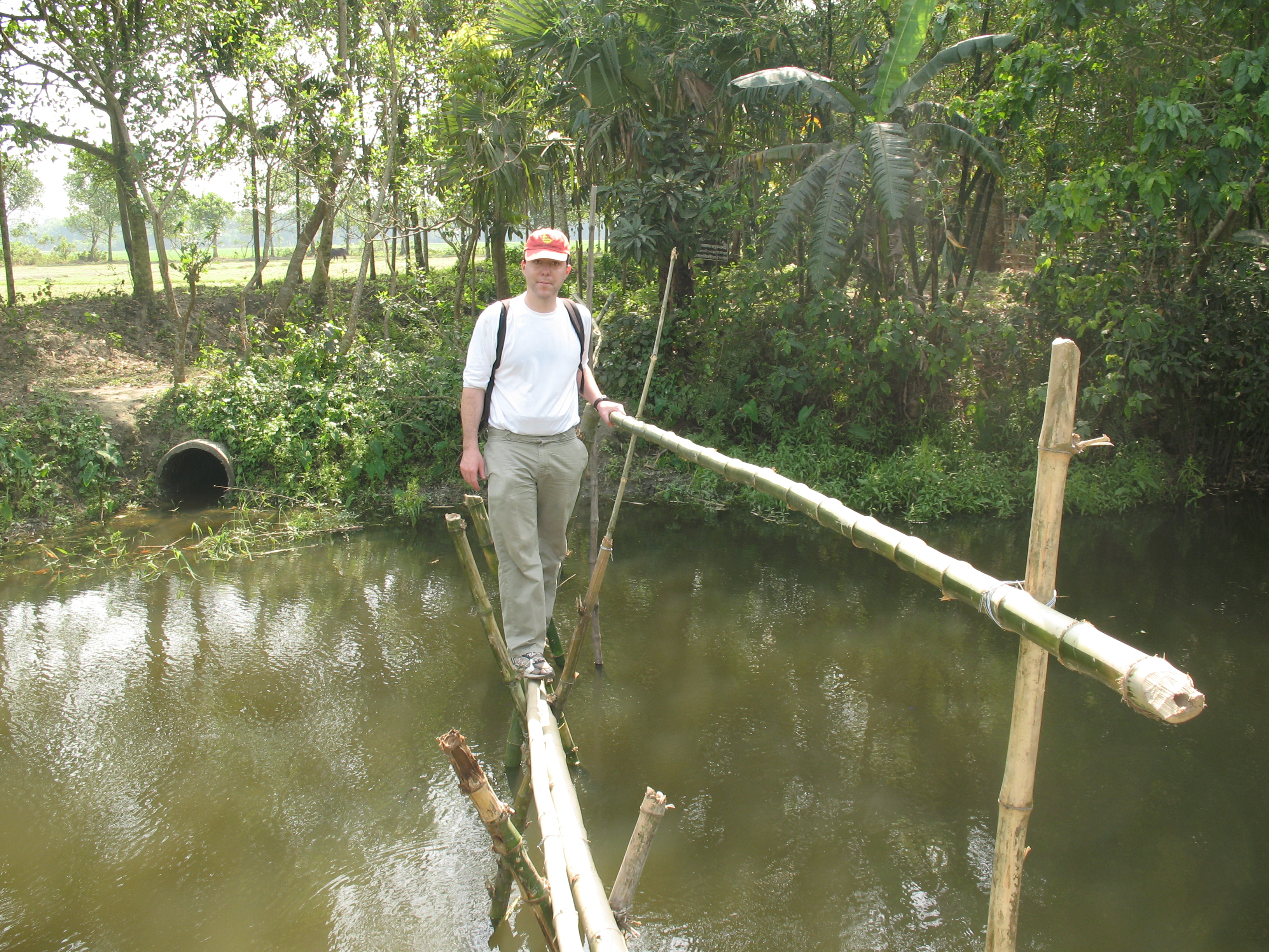 Brian Mailloux in Bangladesh standing on water.
