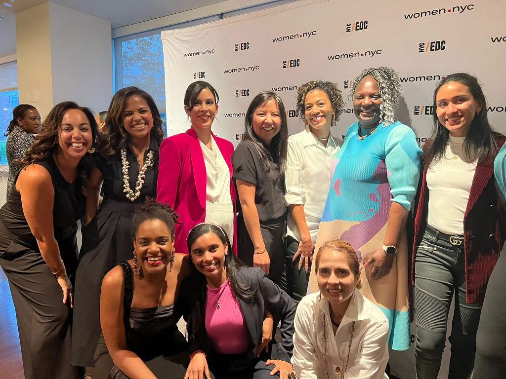 [Image description: Alex Ruiz with a group of entrepreneurs from Women.NYC]