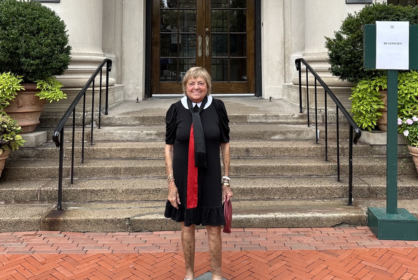 Renée Becker Swartz standing in front of Barnard Hall.