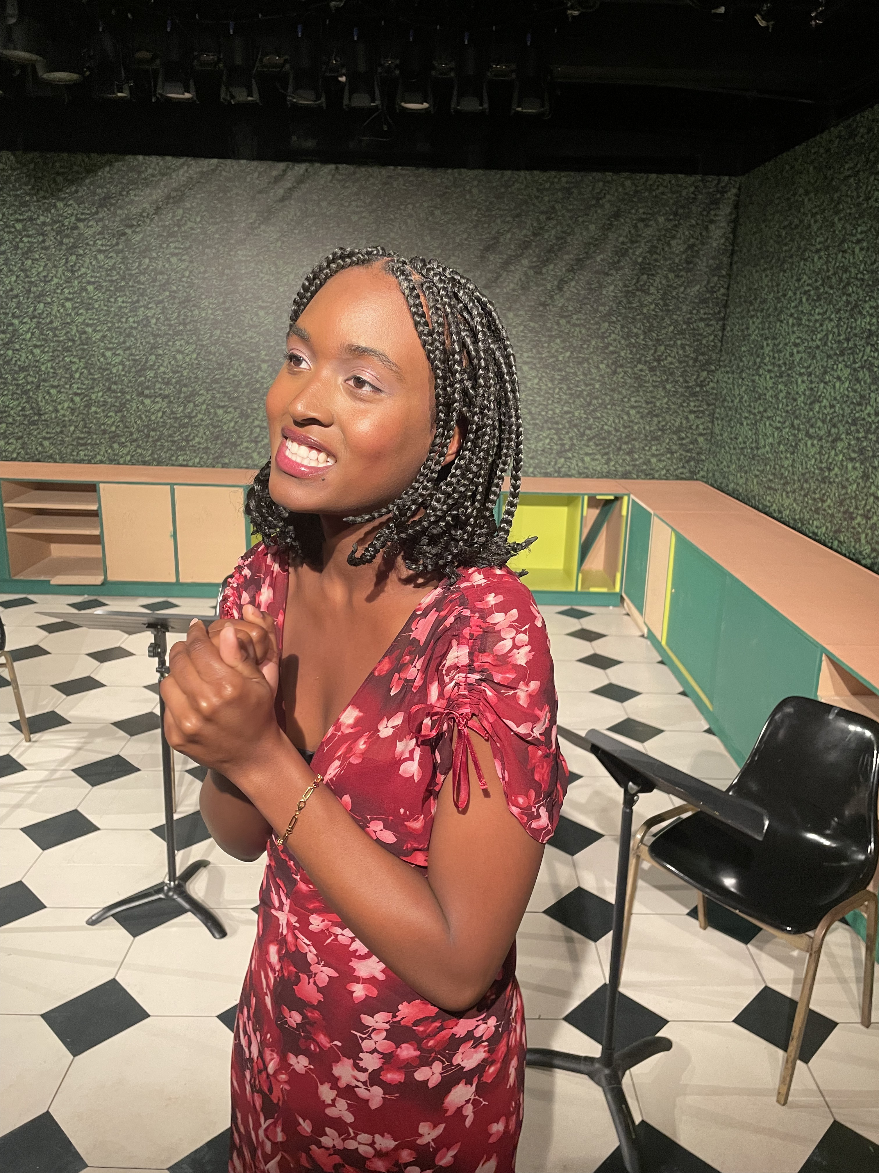 Phanésia Pharel standing and smiling. 