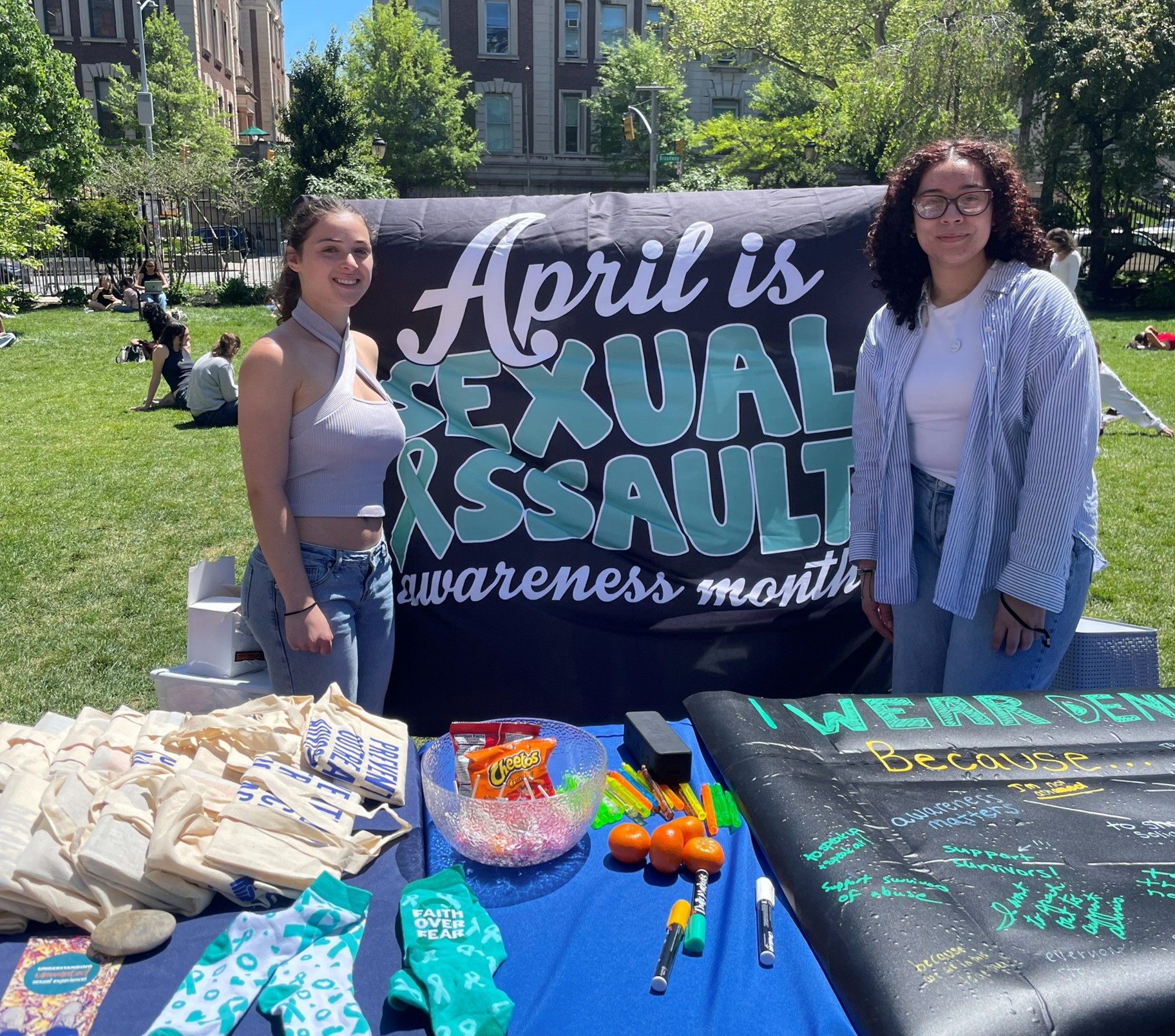 Clery Intern, Daniela & Being Barnard office assistant, Liliannie tabling in April for SAAM