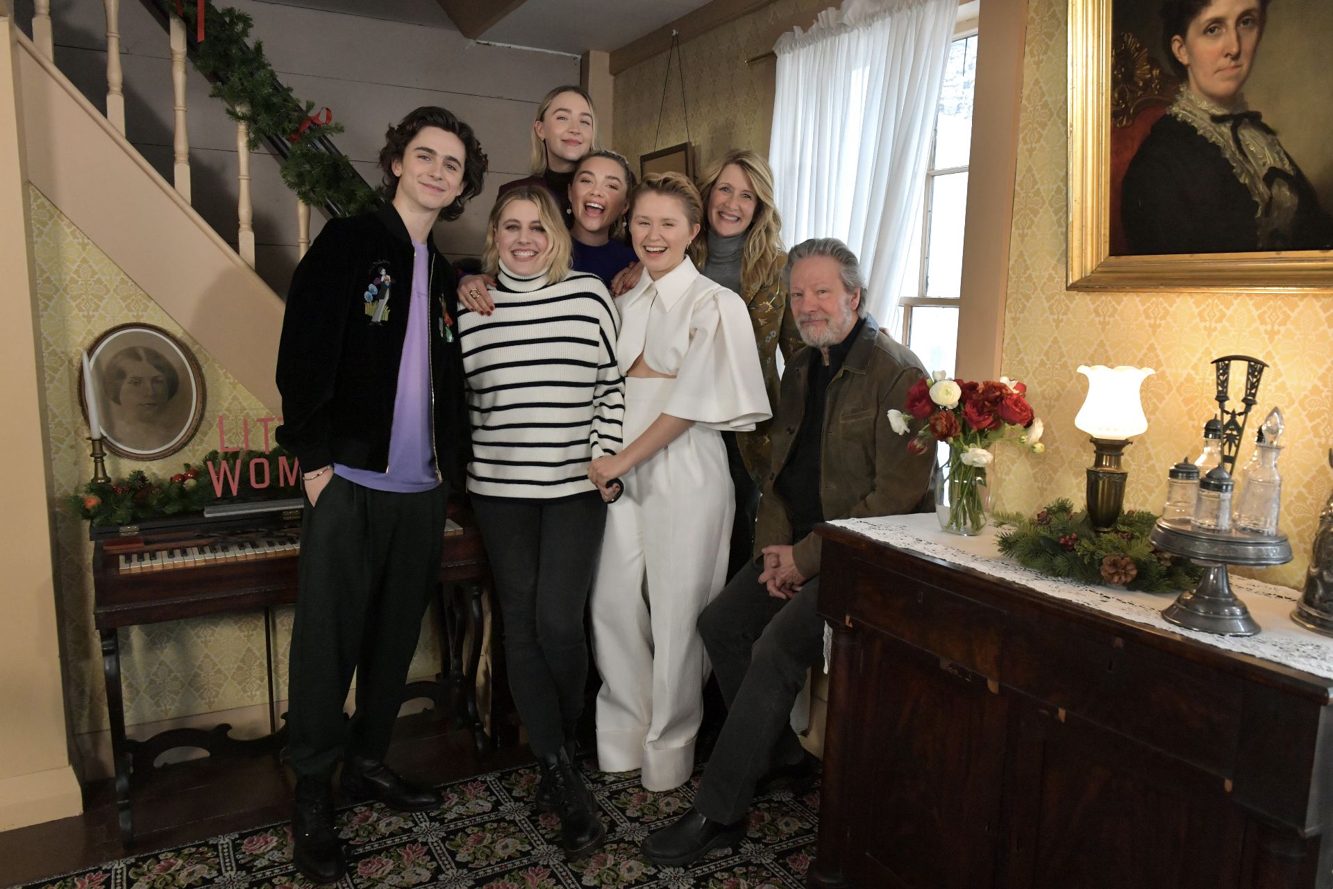 (From left) Timothee Chalamet, writer/director Greta Gerwig '06, Saoirse Ronan, Florence Pugh, Eliza Scanlan, Laura Dern, and Chris Cooper in Concord, MA, at Louisa May Alcott's Orchard House where the author wrote and set 'Little Women.' (Photo courtesy of Sony Pictures Entertainment)