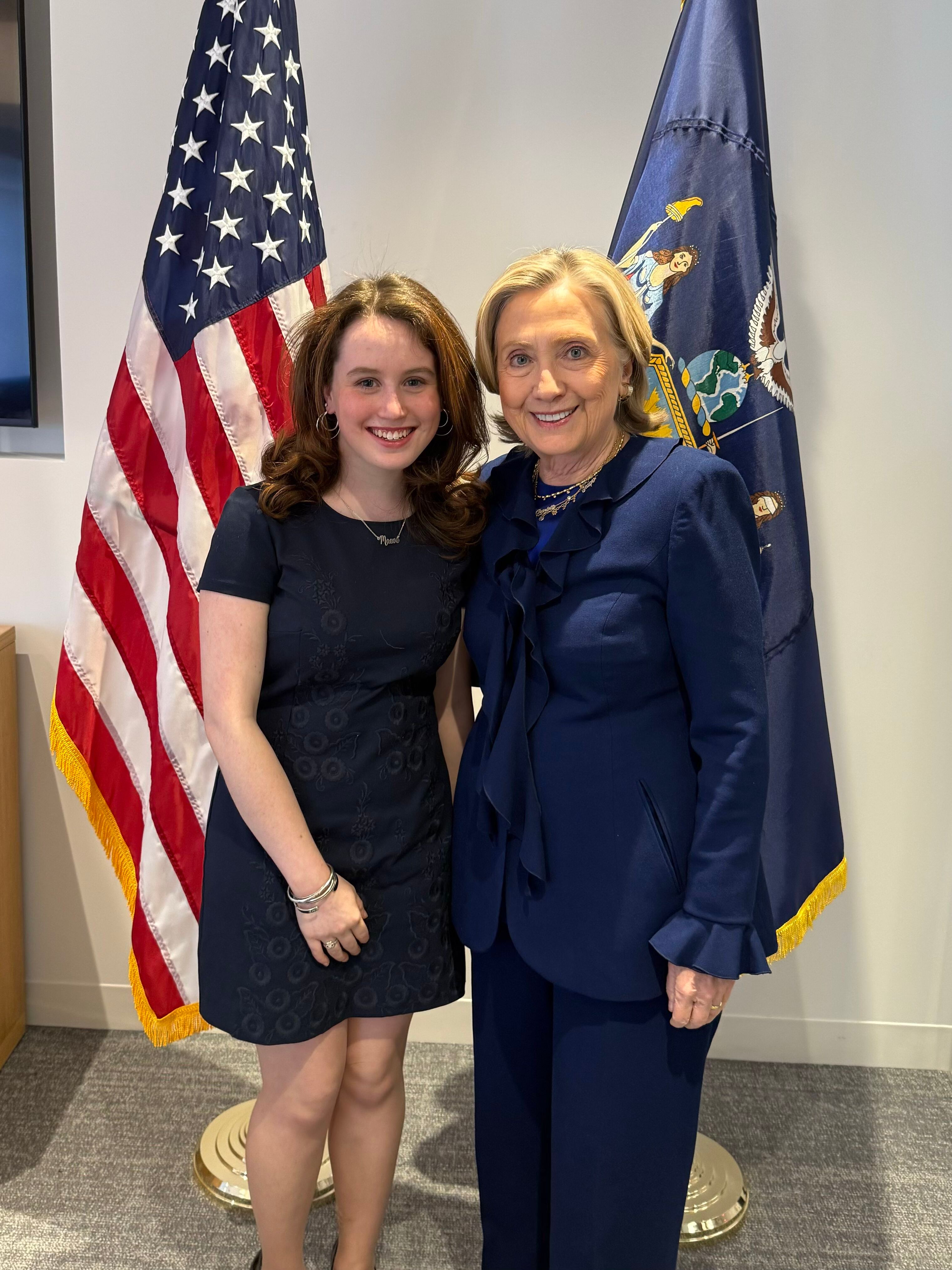 Maeve Sanford-Kelly posing with Hillary Clinton.