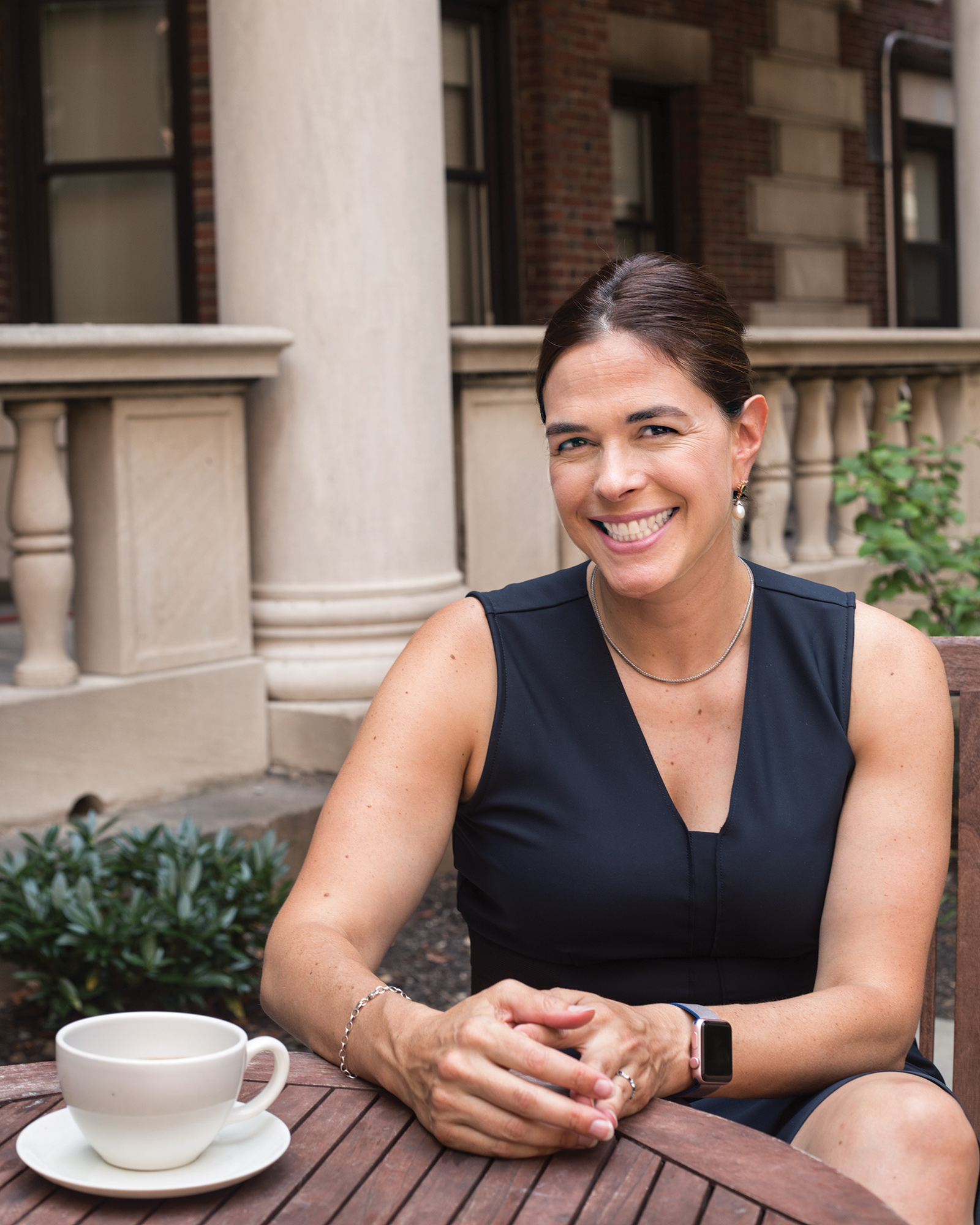 Sian Beilock seated at an outdoor table