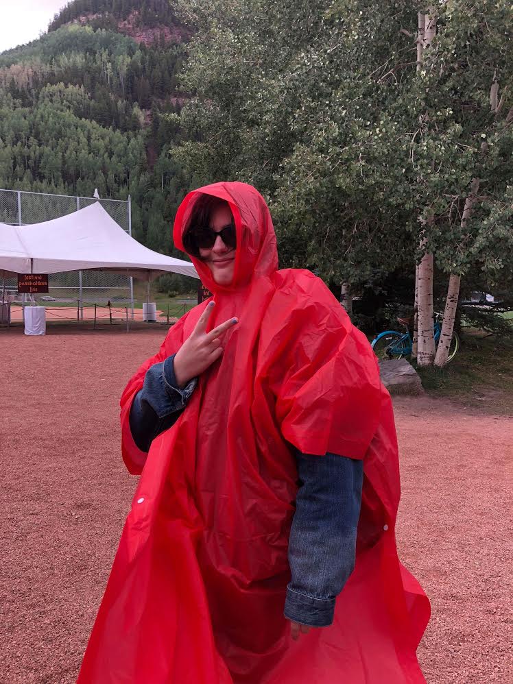 Post-Bac Fellow Ruby at the Telluride Film Festival in a red poncho