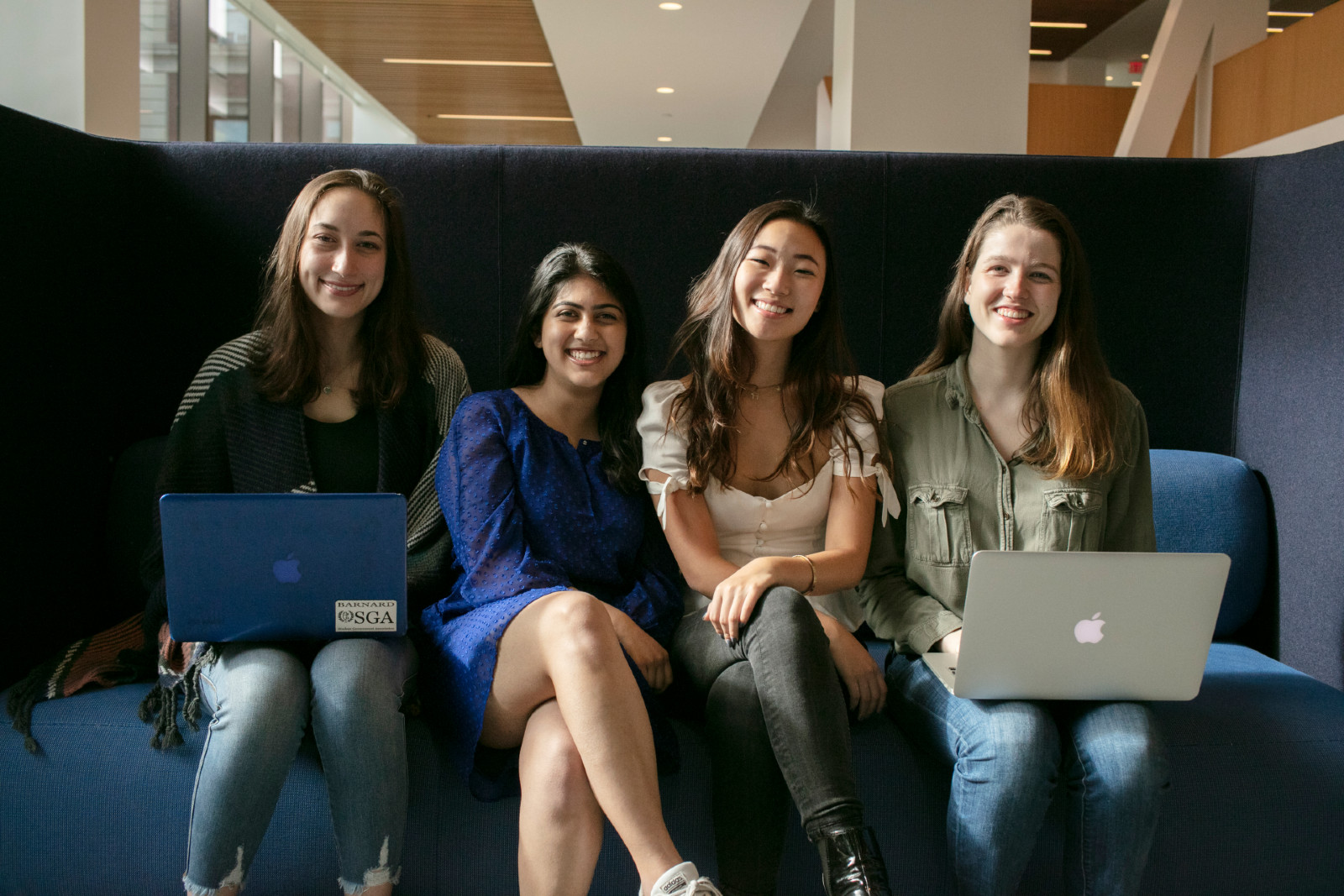 students on couch in milstein center