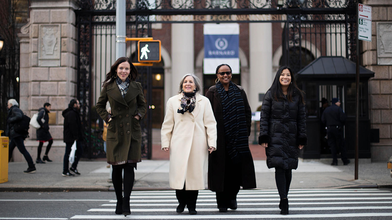 Alumnae on broadway in front of gates