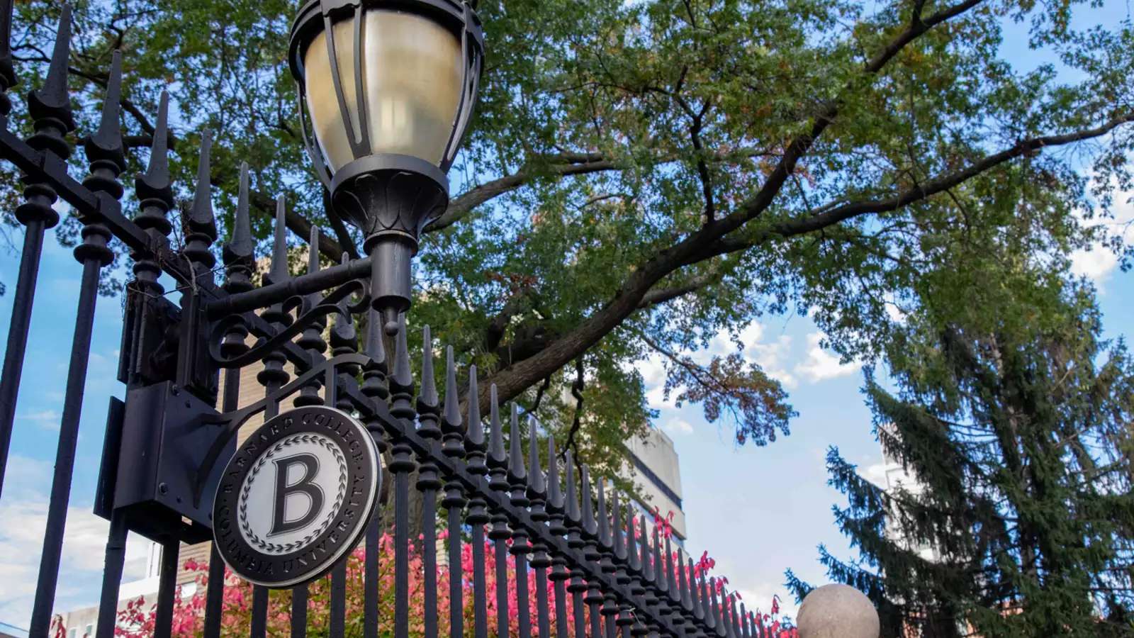 Barnard campus gates with the Barnard "B" sign