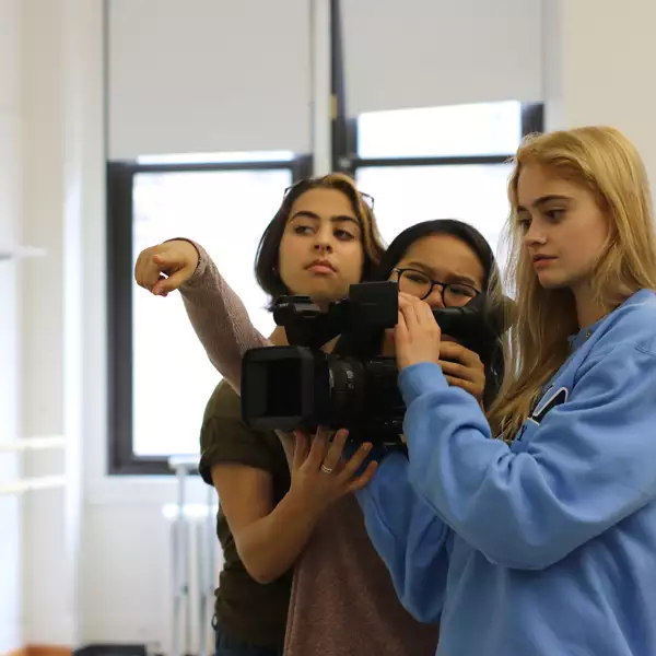 students filming