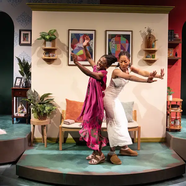 Patrice Johnson Chevannes (Emi) and Natalie Paul (Bean) dancing in The Waterfall. 