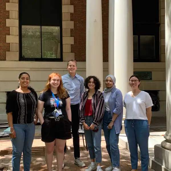 Prof. White and Students. Sanders, second from left. Hossain, second from right..