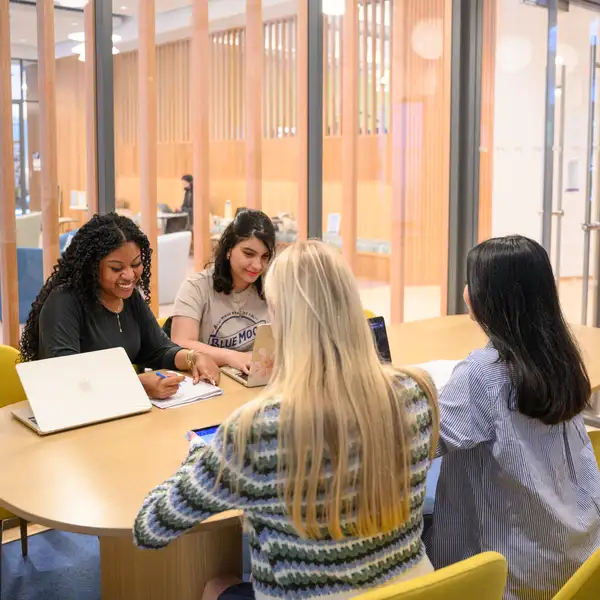 students at a desk 