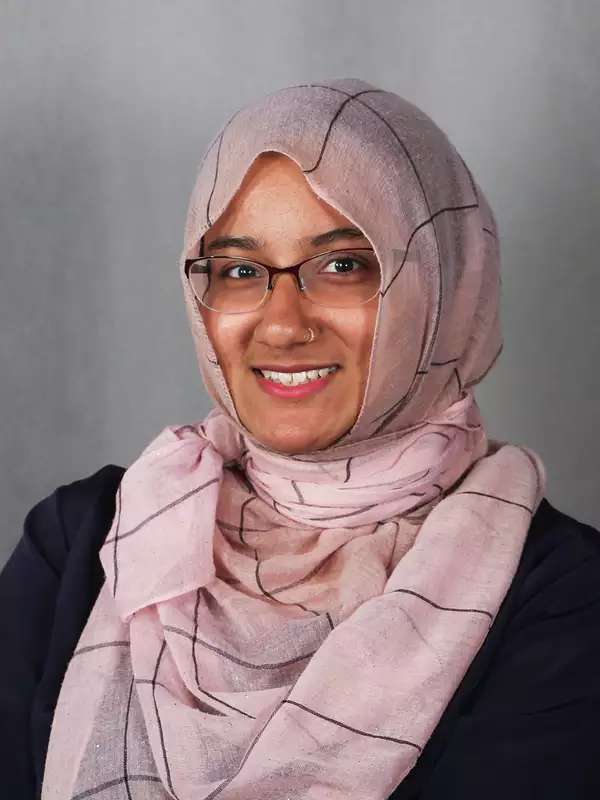 Headshot of Aziza