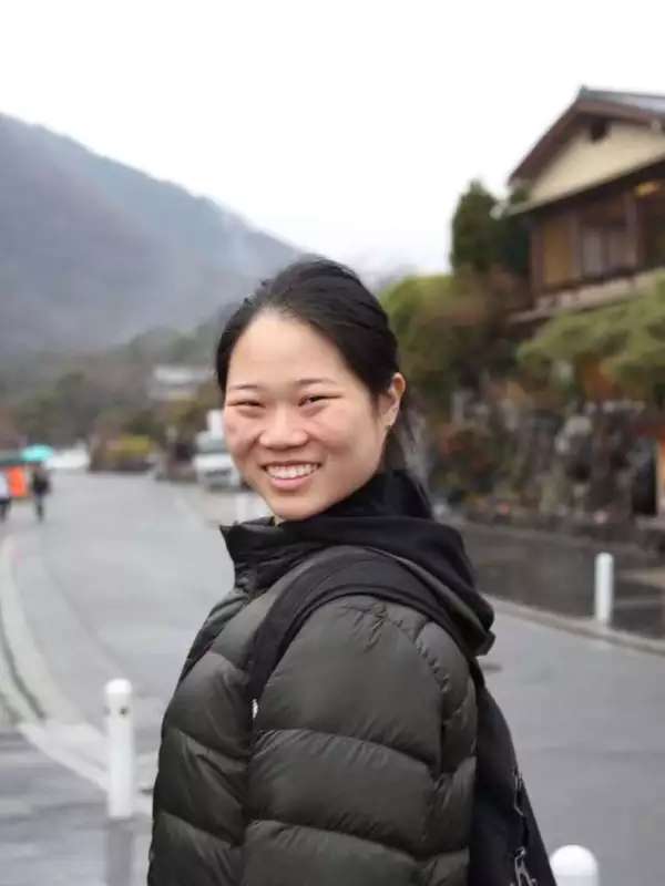 Image of girl facing camera smiling