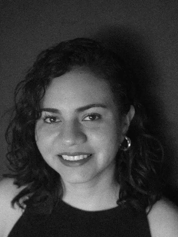 Black and white headshot of a woman