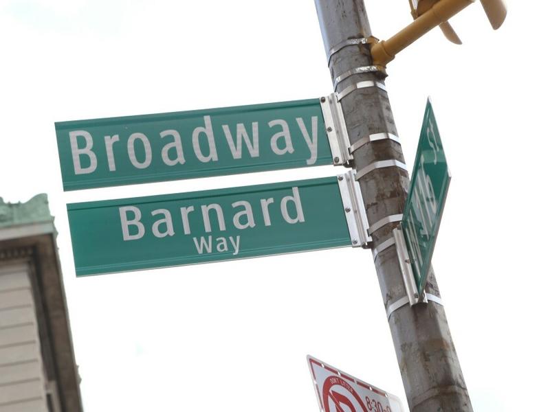 show street sign that says broadway and sign underneath that reads barnard way