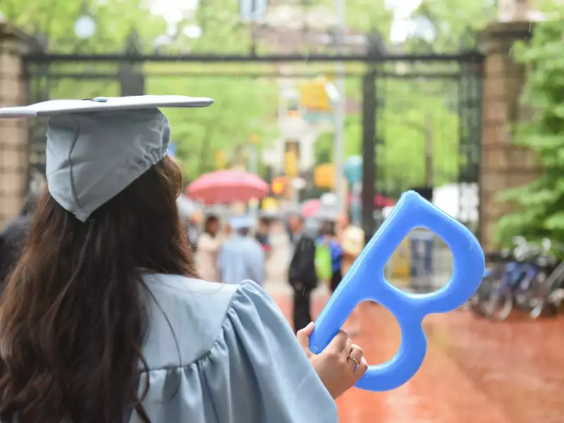 Barnard Grad at front gate