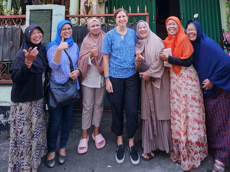 Rachel Rinaldo working alongside women in Indonesia. 